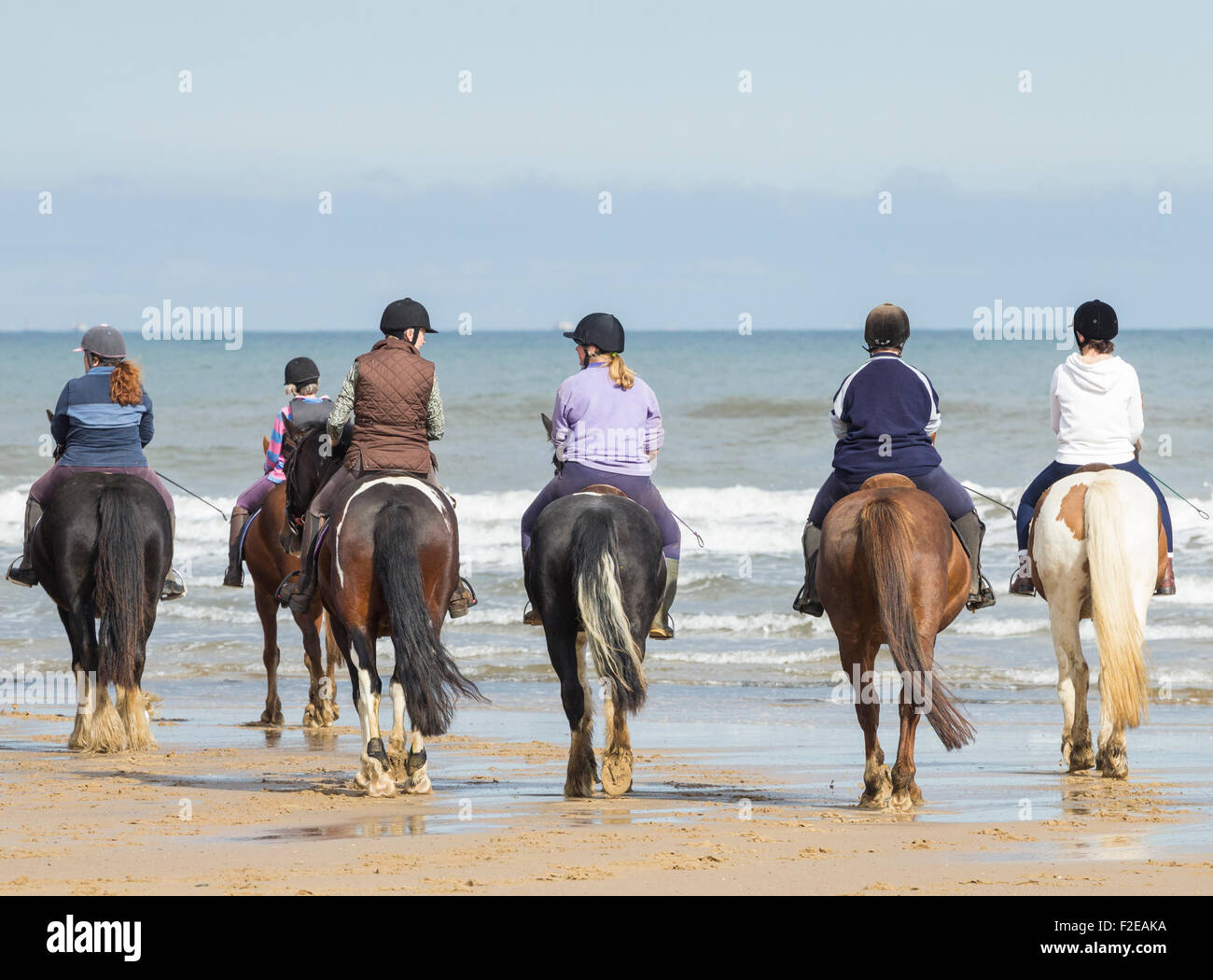 Reiten auf Saltburn Strand. Saltburn am Meer, North Yorkshire, England. Großbritannien Stockfoto