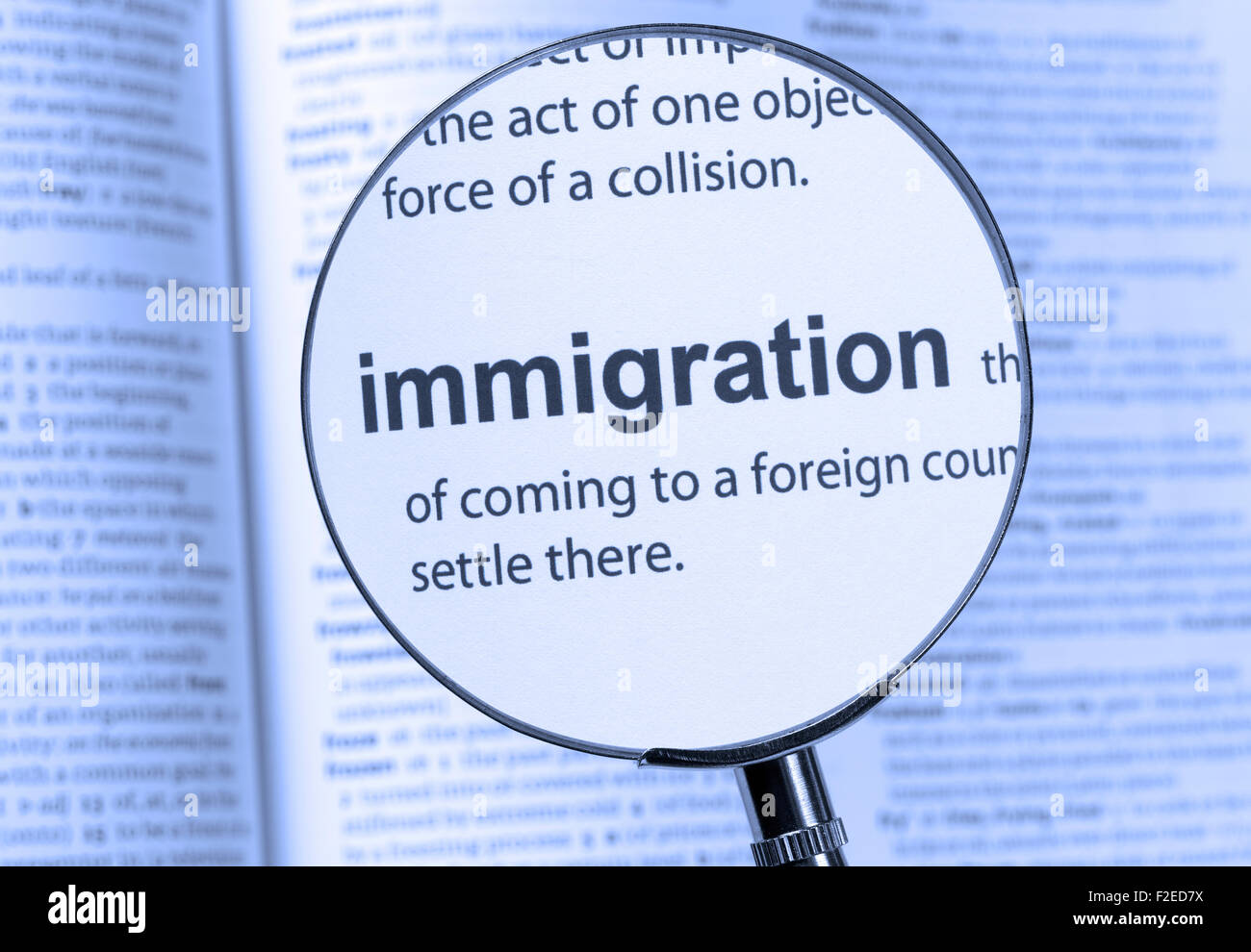 Einwanderung-Text hervorgehoben durch ein Vergrößerungsglas Stockfoto