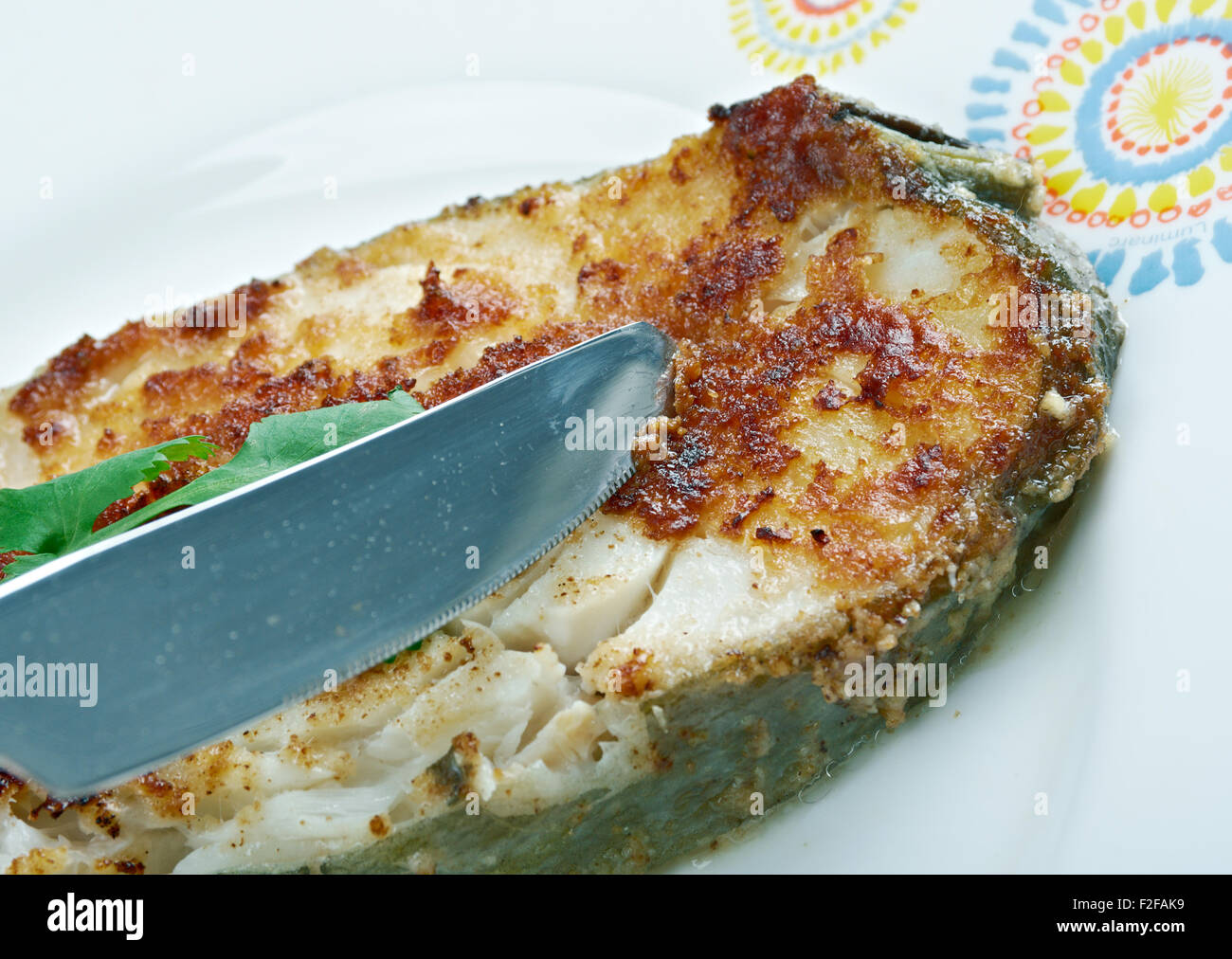 Südafrikanische Fisch - Pfanne gebraten Knoblauch Kingklip Stockfoto