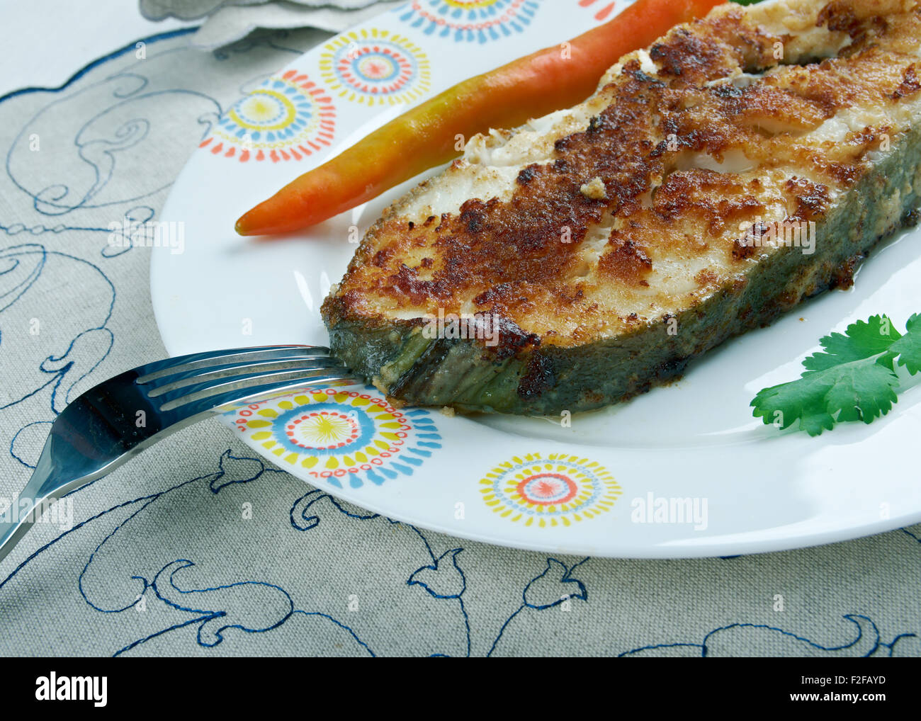 Südafrikanische Fisch - Pfanne gebraten Knoblauch Kingklip Stockfoto