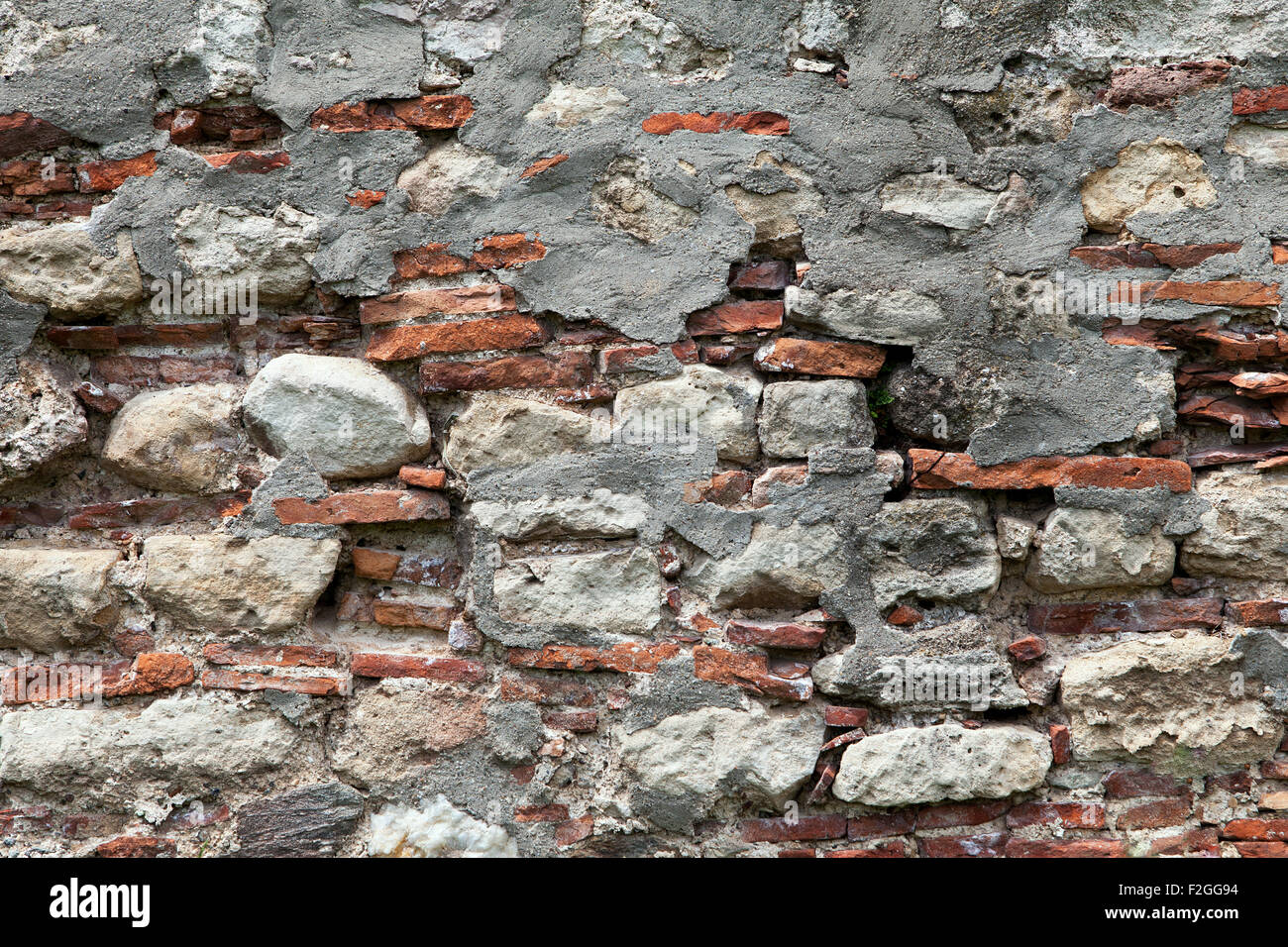 Alten verwitterten Steinwand für Hintergrund oder Textur Stockfoto Alten verwitterten Steinwand für Hintergrund oder Textur Stockfoto