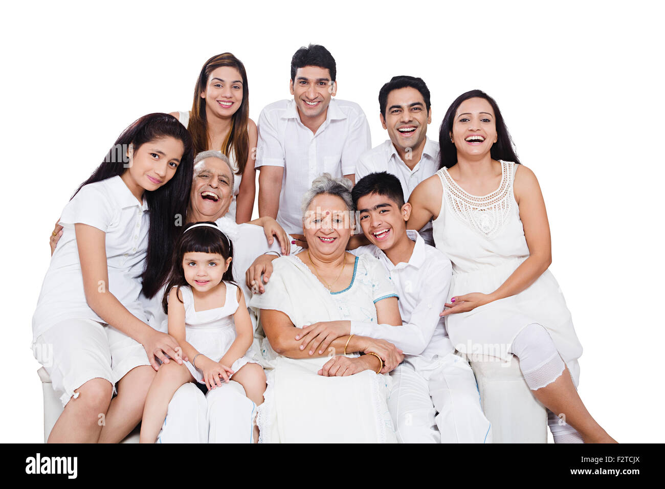 Genießen Sie indische Gruppe gemeinsame Familie sitzen sofa Stockfoto