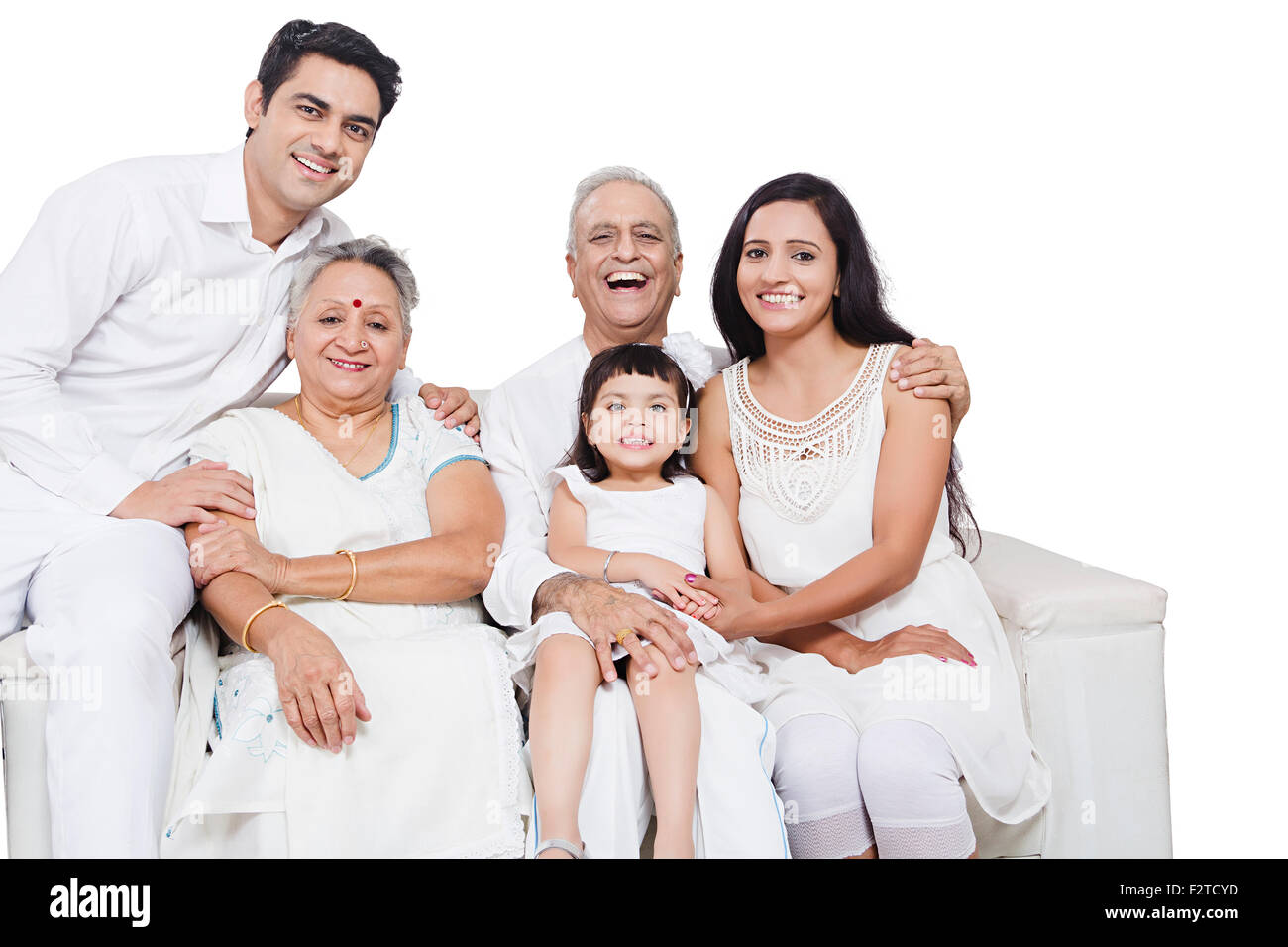Genießen Sie indische Gruppe gemeinsame Familie sitzen sofa Stockfoto