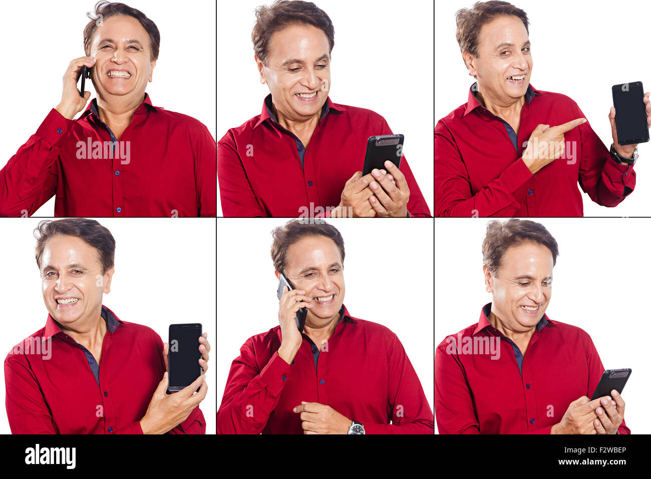 1 indische erwachsenen Mann Handy Vergleich Multi Tasking Stockfoto