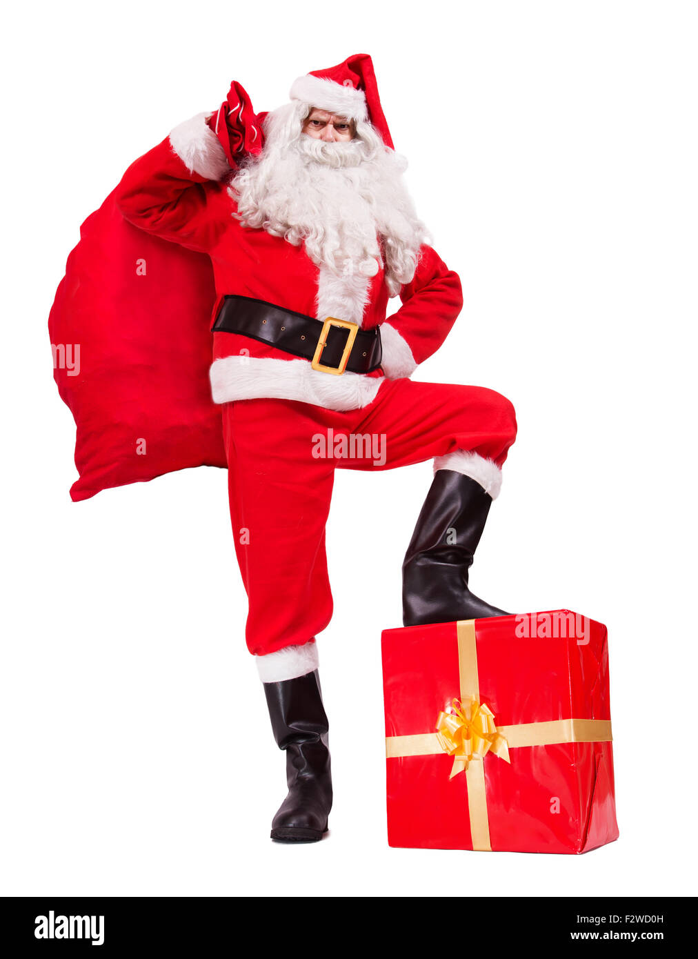 Santa Claus posiert mit Weihnachtsgeschenke isoliert auf weißem Hintergrund Stockfoto