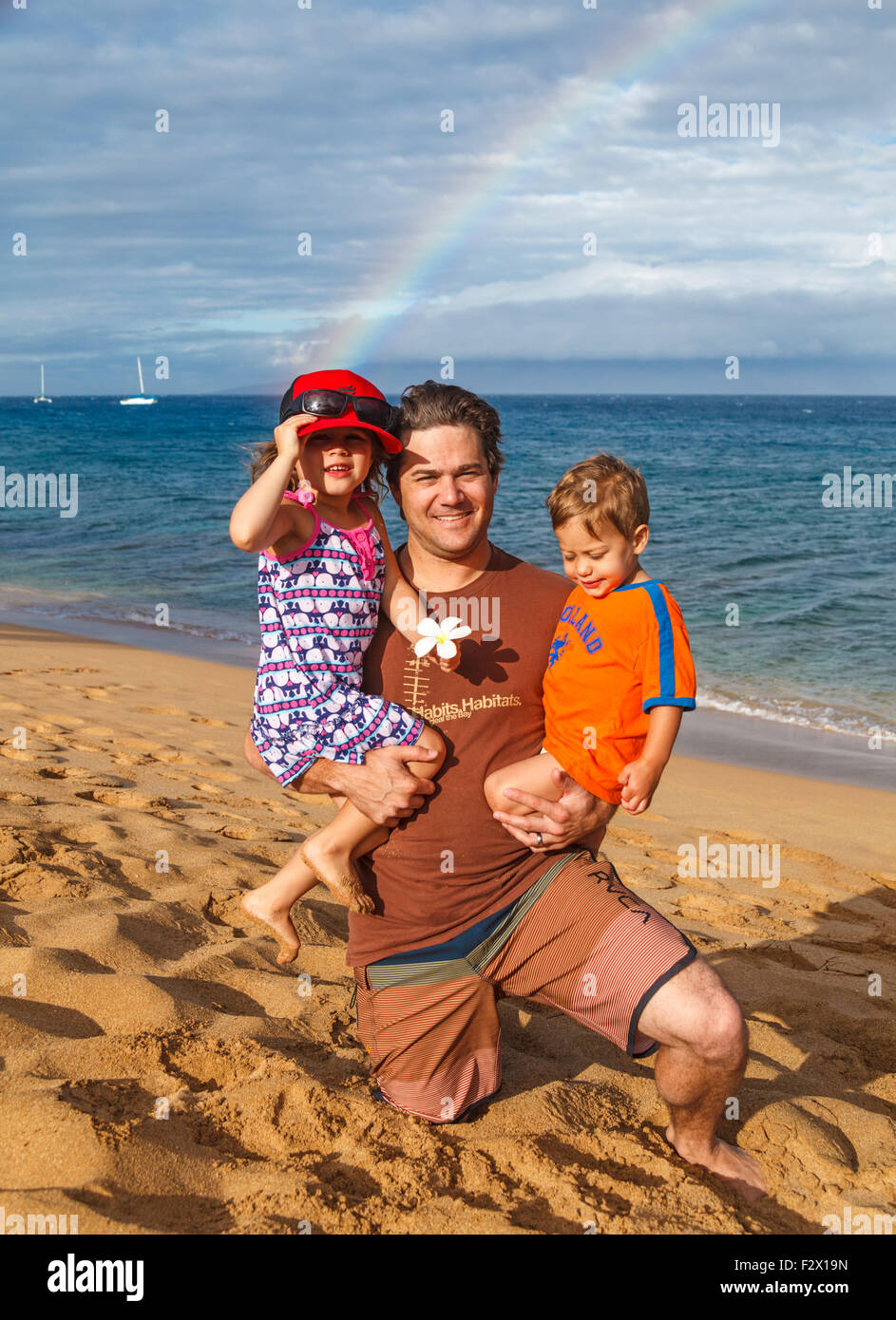 Vater mit Kindern am Kaanapali Strand Nord auf Maui Stockfoto