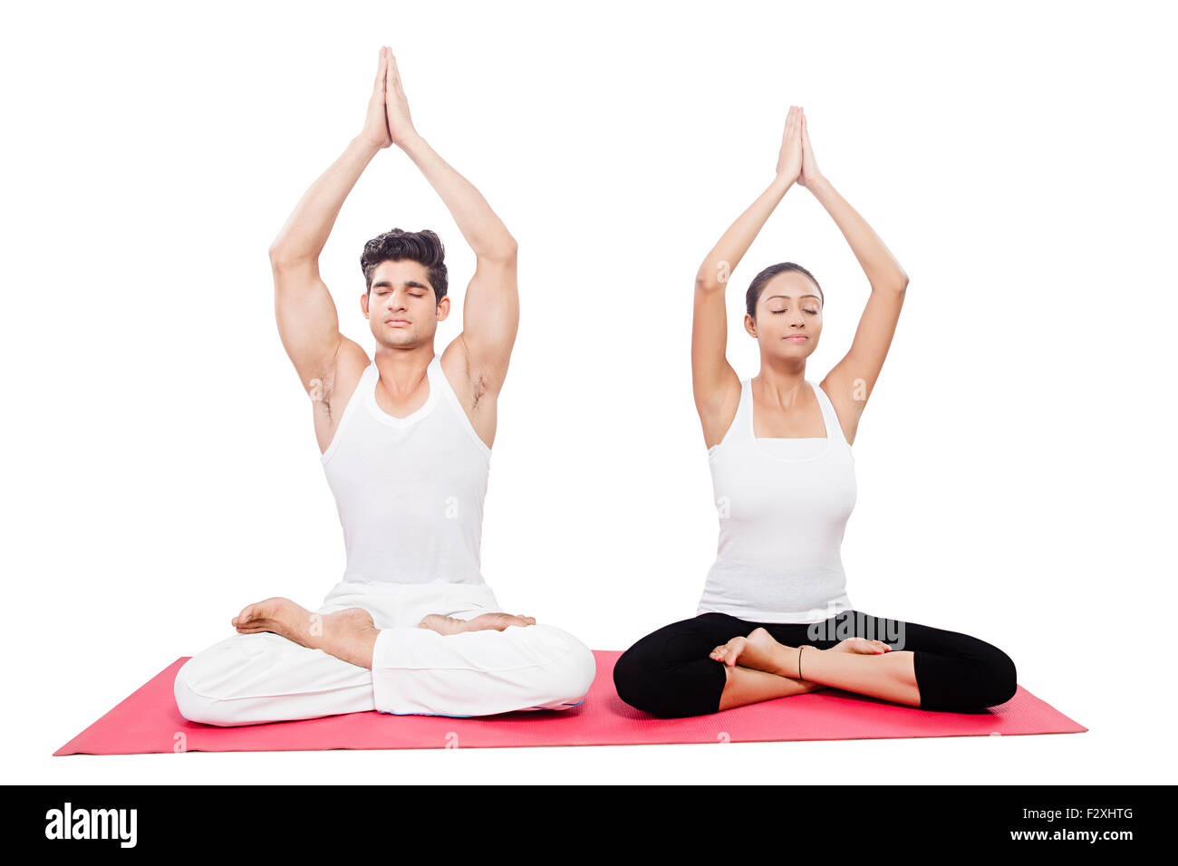 2 indische paar Yoga Surya Namaskar Stockfoto