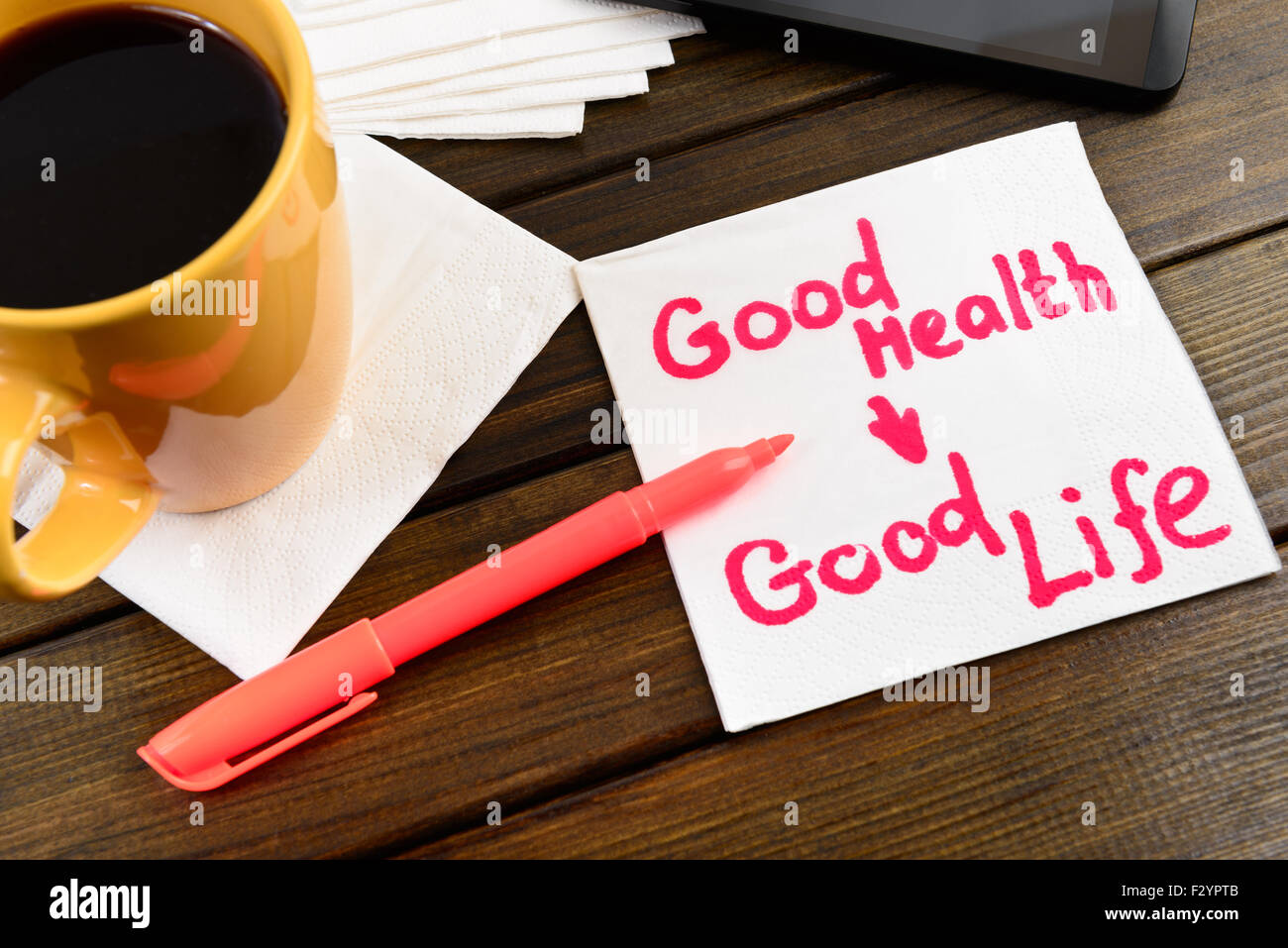 Serviette skizzieren "gute Gesundheit guten Lebens" auf Café Serviette Stockfoto