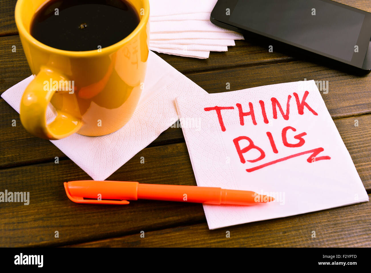 Serviette skizzieren "Think big" auf Café Serviette Stockfoto