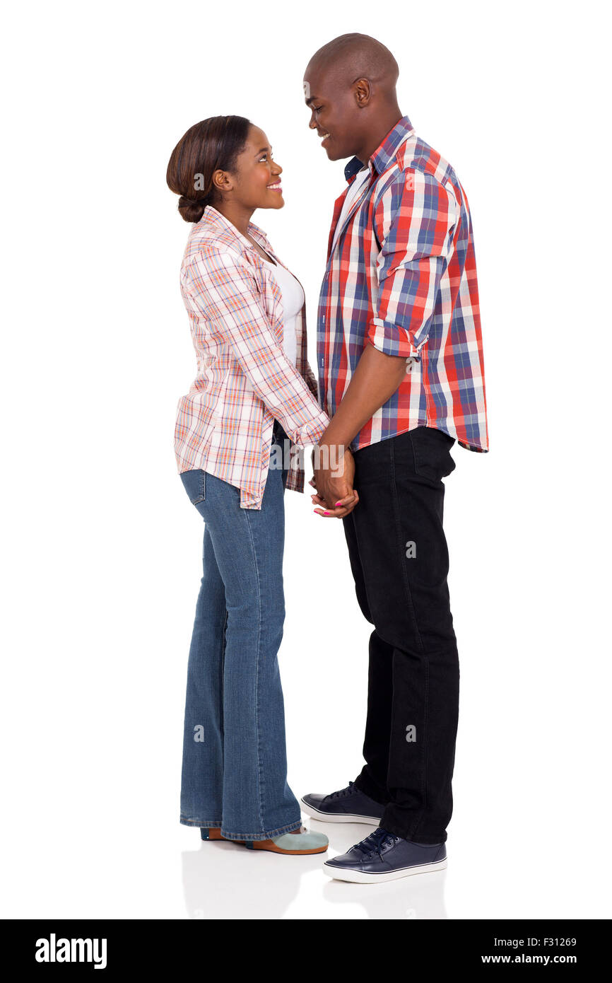 African American Liebespaar Hand in Hand auf weißem Hintergrund Stockfoto