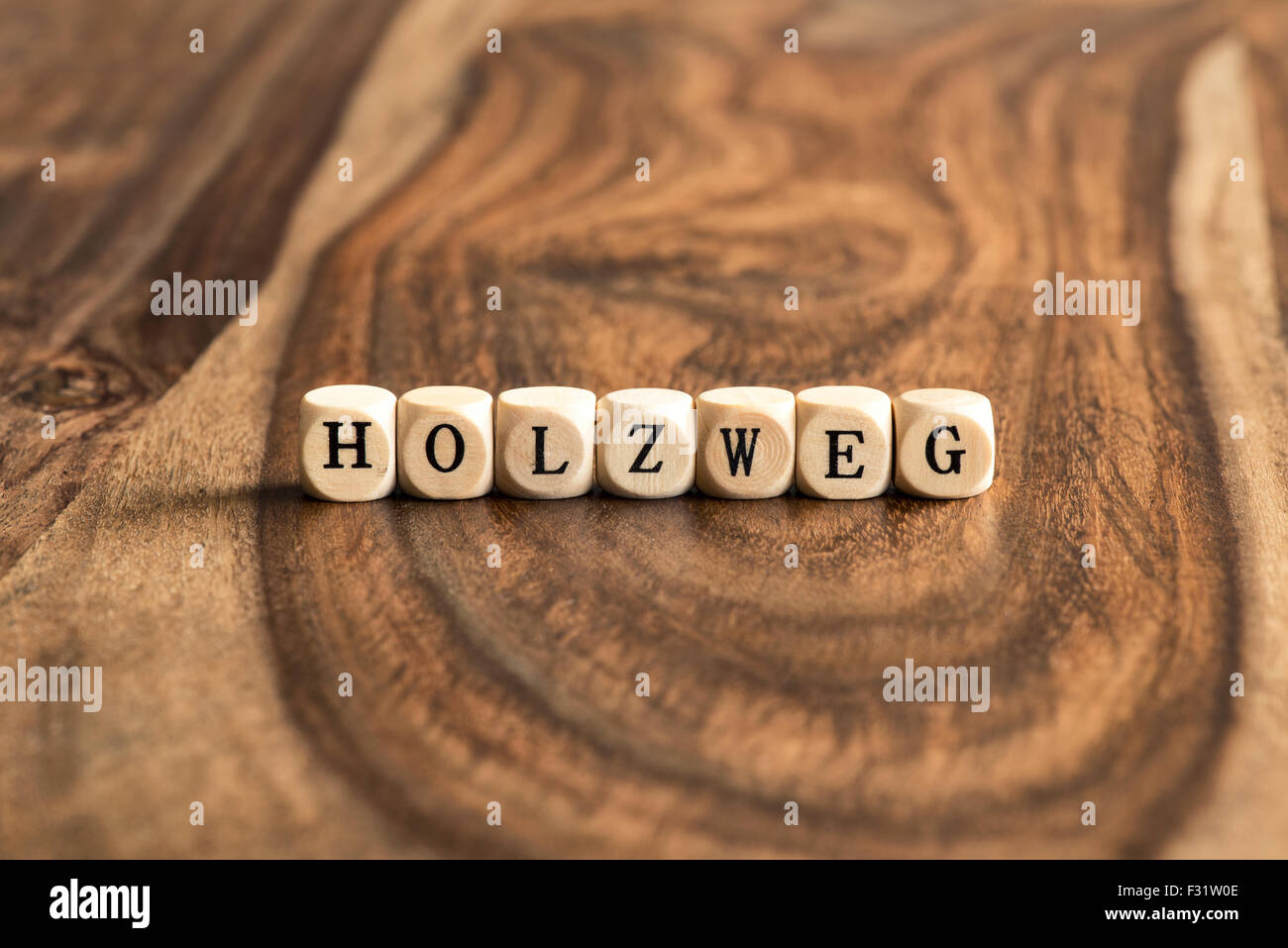 HOLZWEG-Word-Hintergrund auf Holzblöcke Stockfoto