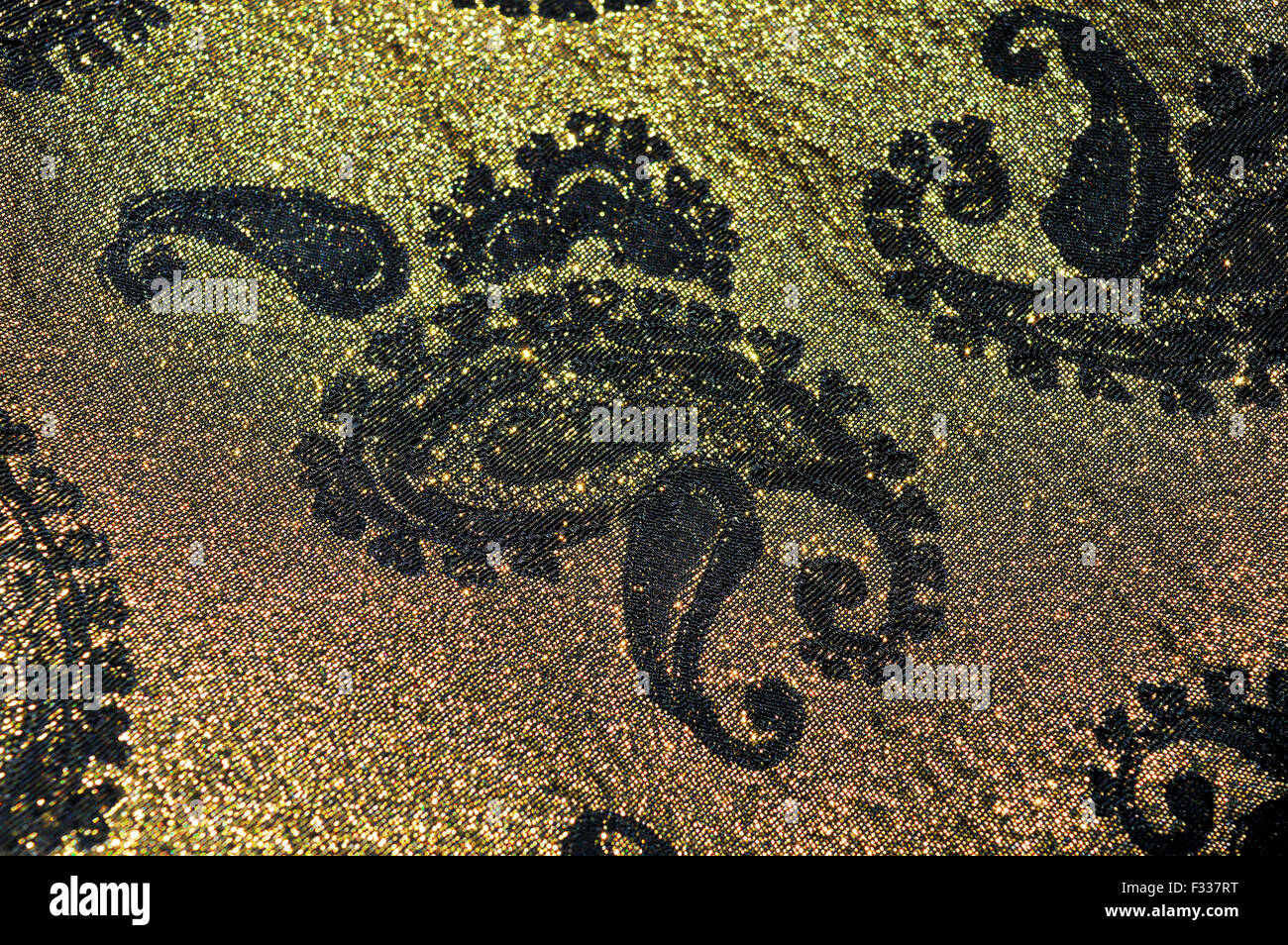 Gold und schwarz floral Stoff Hintergrund Stockfoto