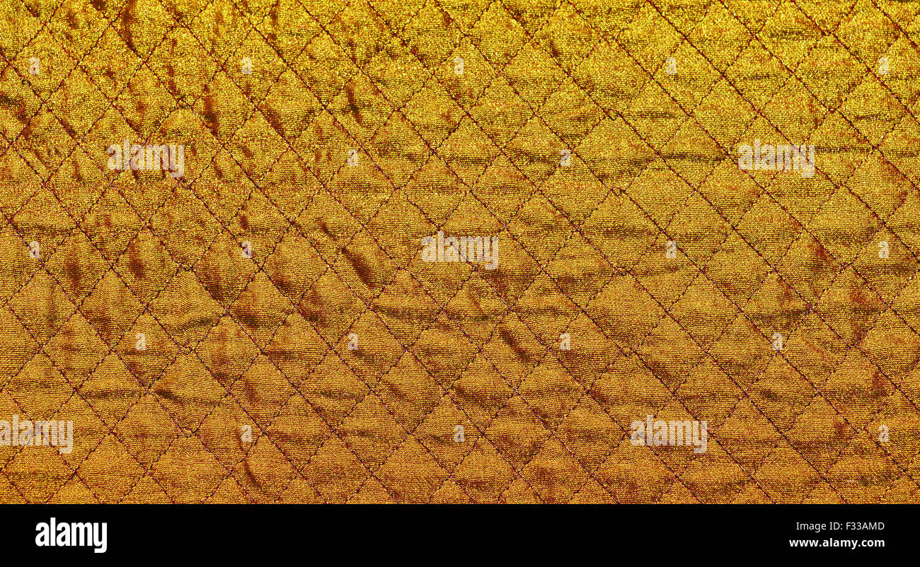 Gold rautenförmigen Stoff Hintergrund Stockfoto