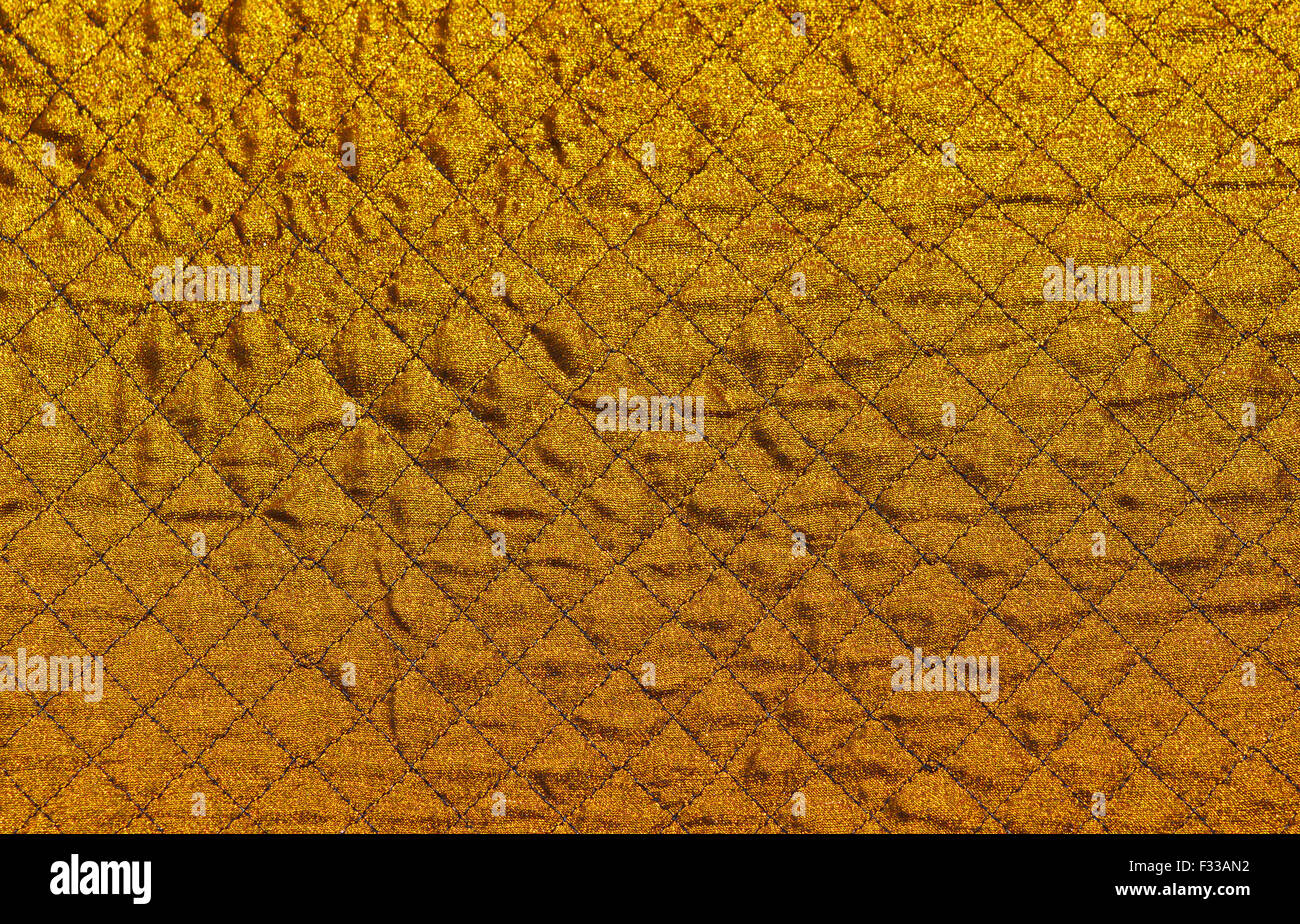Gold rautenförmigen Stoff Hintergrund Stockfoto