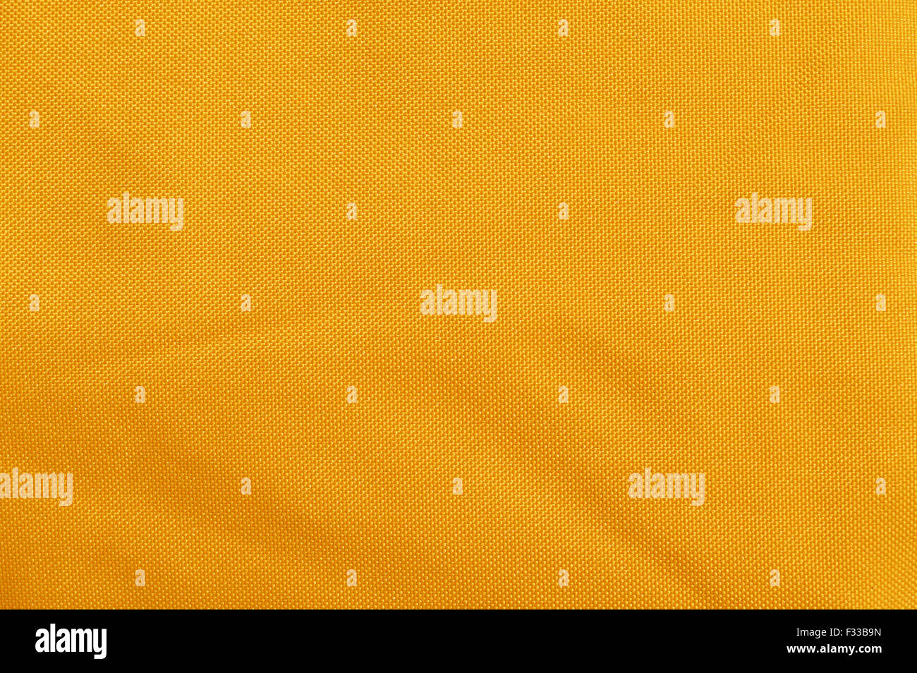 Gelbe Textilhintergrund Stockfoto