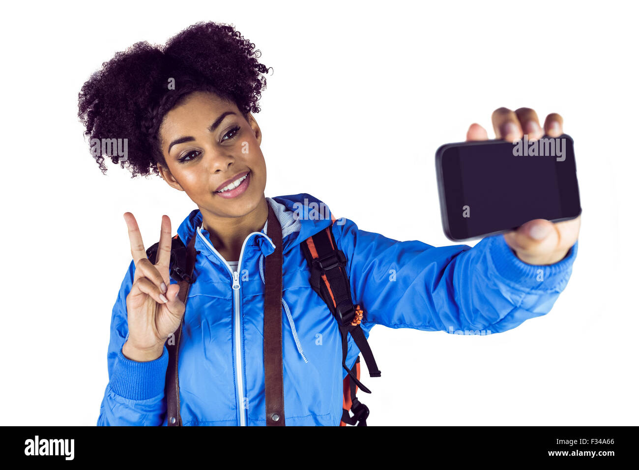Junge Frau Die Ein Selfie Nimmt Fotos Und Bildmaterial In Hoher junge-frau-die-ein-selfie-nimmt-fotos-und-bildmaterial-in-hoher