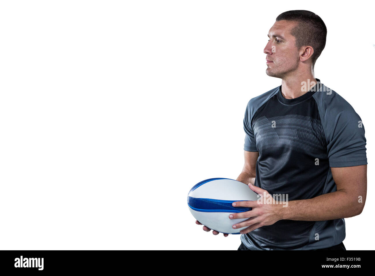 Rugby-Spieler aus schwarzem Jersey mit ball Stockfoto