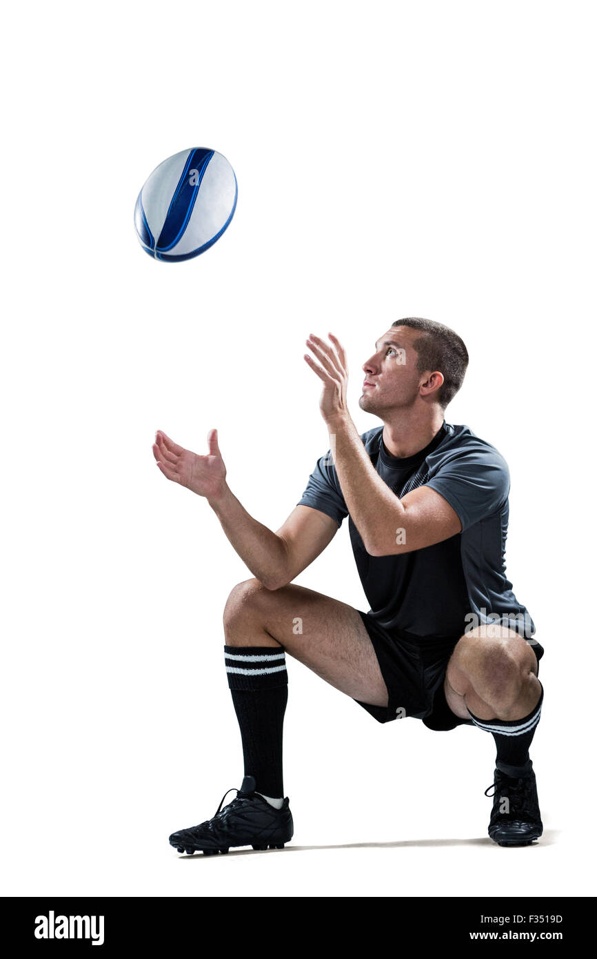 Volle Länge des Rugby-Spieler den Ball fängt Stockfoto