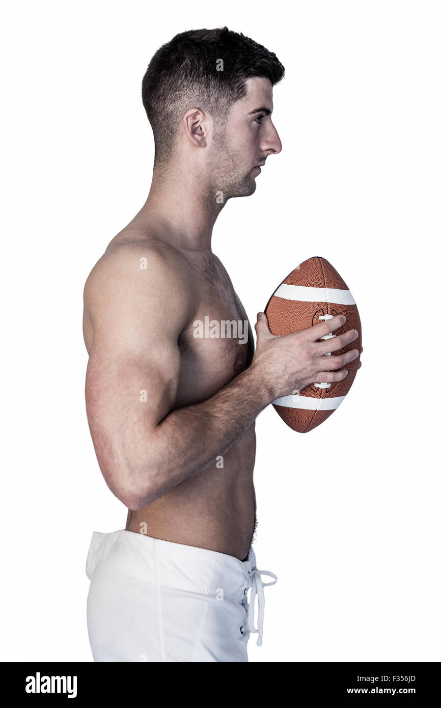 Seitenansicht der ein Hemd Rugby-Spieler mit ball Stockfoto