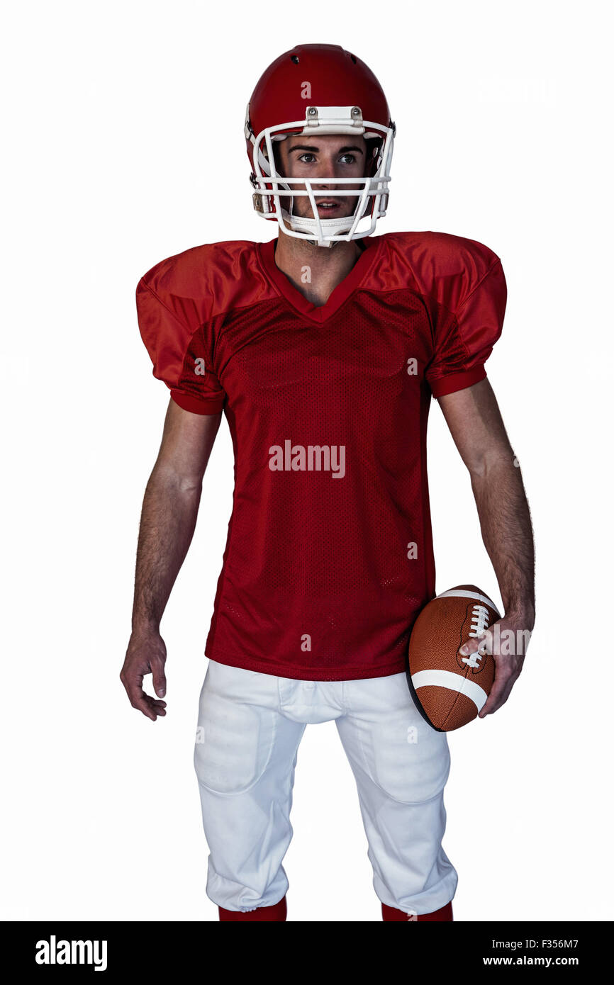 Überrascht Rugby-Spieler halten ball Stockfoto