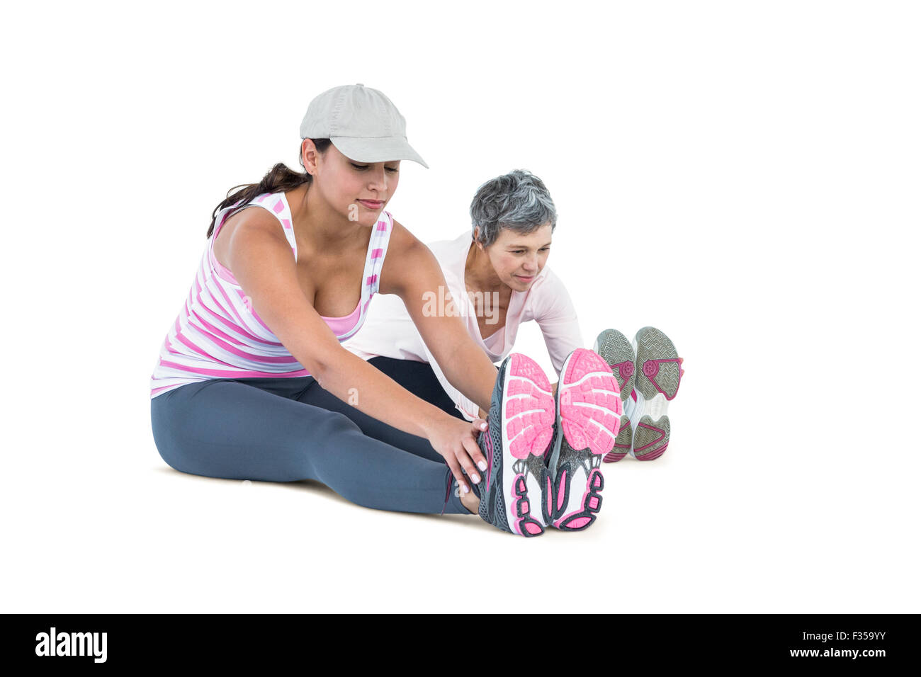 Frauen, die Dehnung während des Trainings Stockfoto