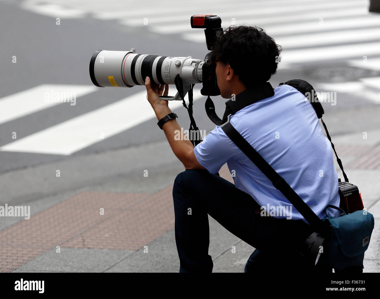 Japaner mit Teleobjektiv Stockfoto