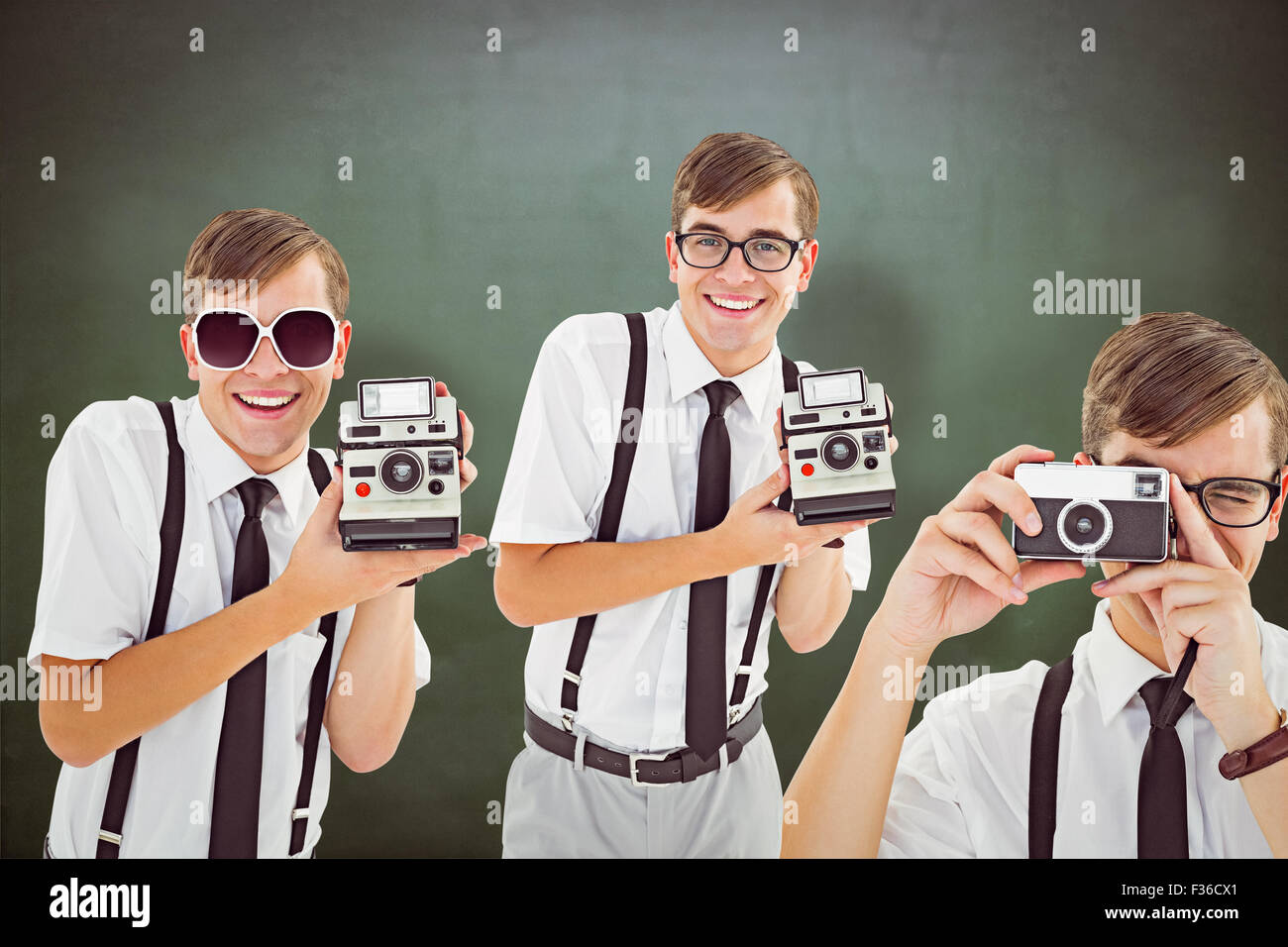 Zusammengesetztes Bild von Geek mit Kamera Stockfoto