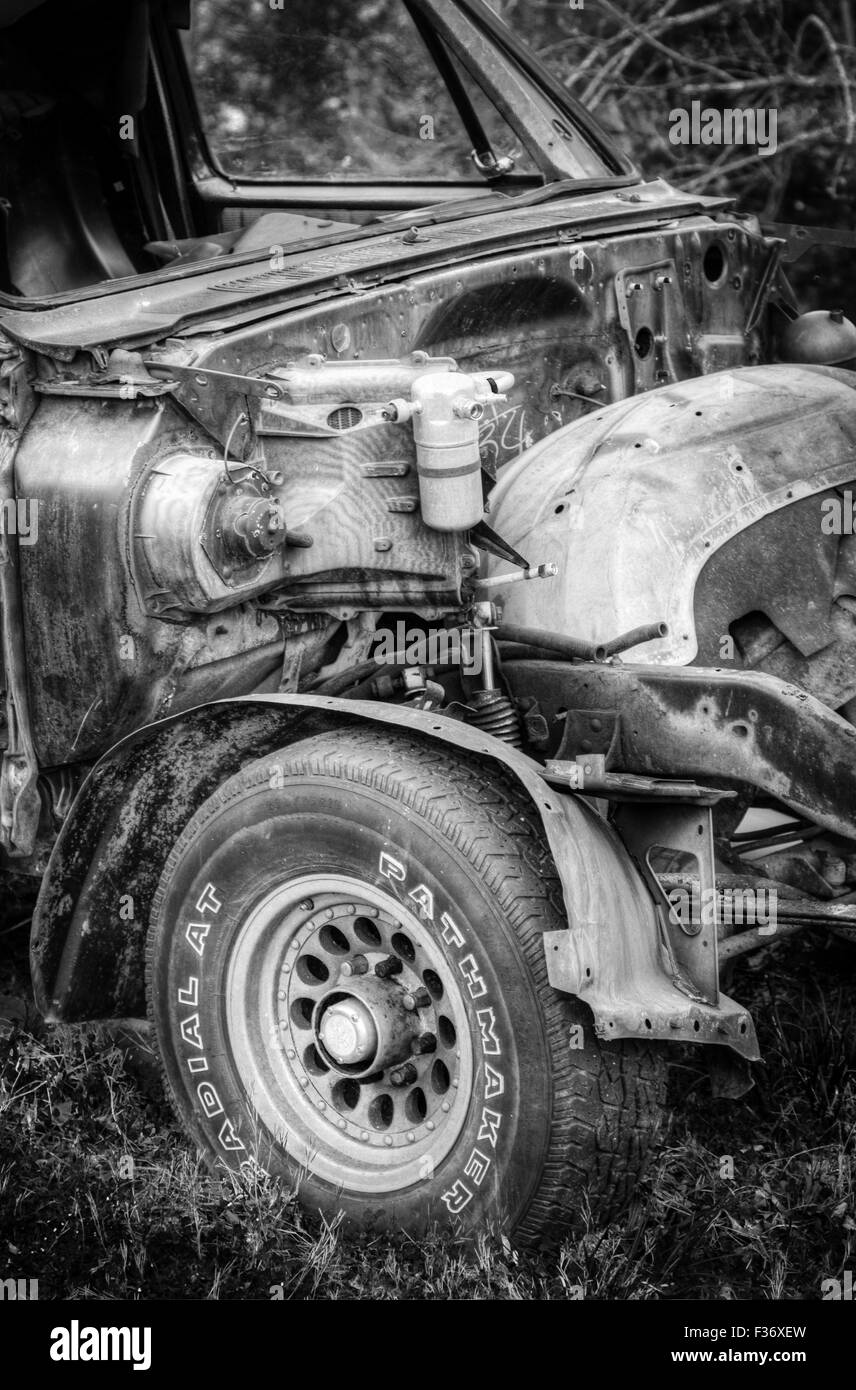 Eine rostige alte Schrottauto Stockfoto