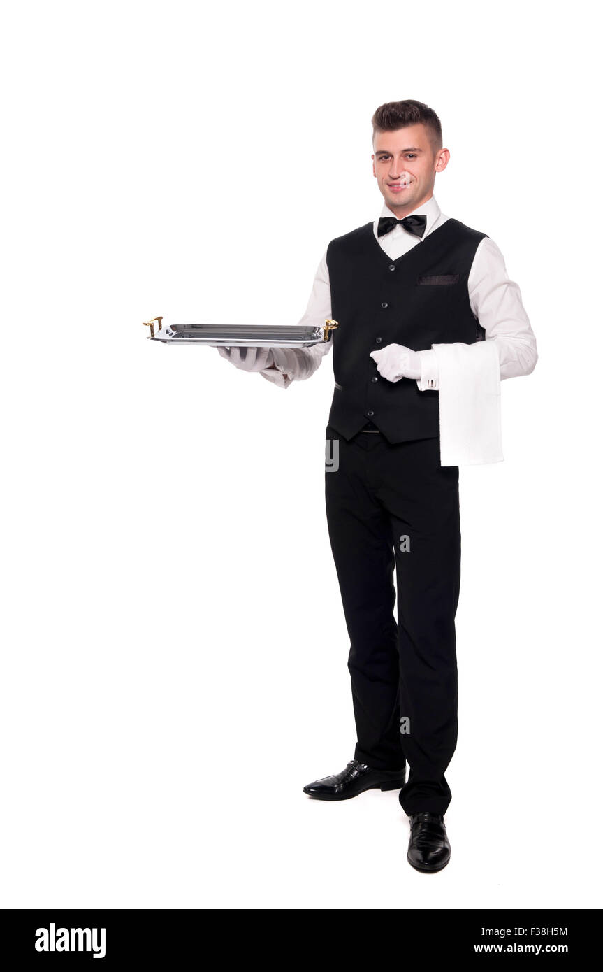 Ein Kellner oder Barkeeper oder Diener hält ein silbernes Tablett und lächelnd. Weißen Hintergrund. Stockfoto