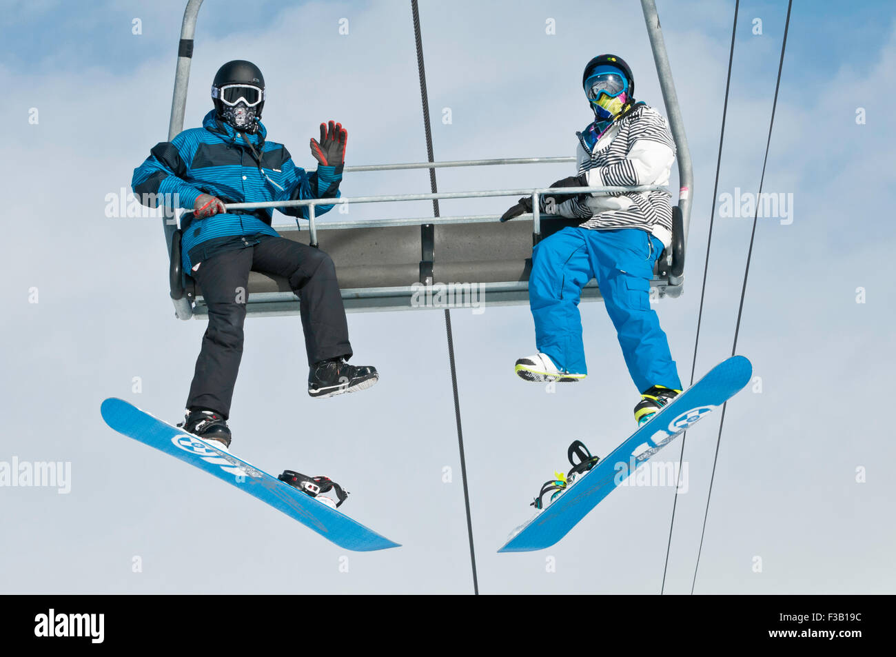 Snowboarder am Skilift, Canada Olympic Park, COP, Calgary, Alberta, Kanada Stockfoto