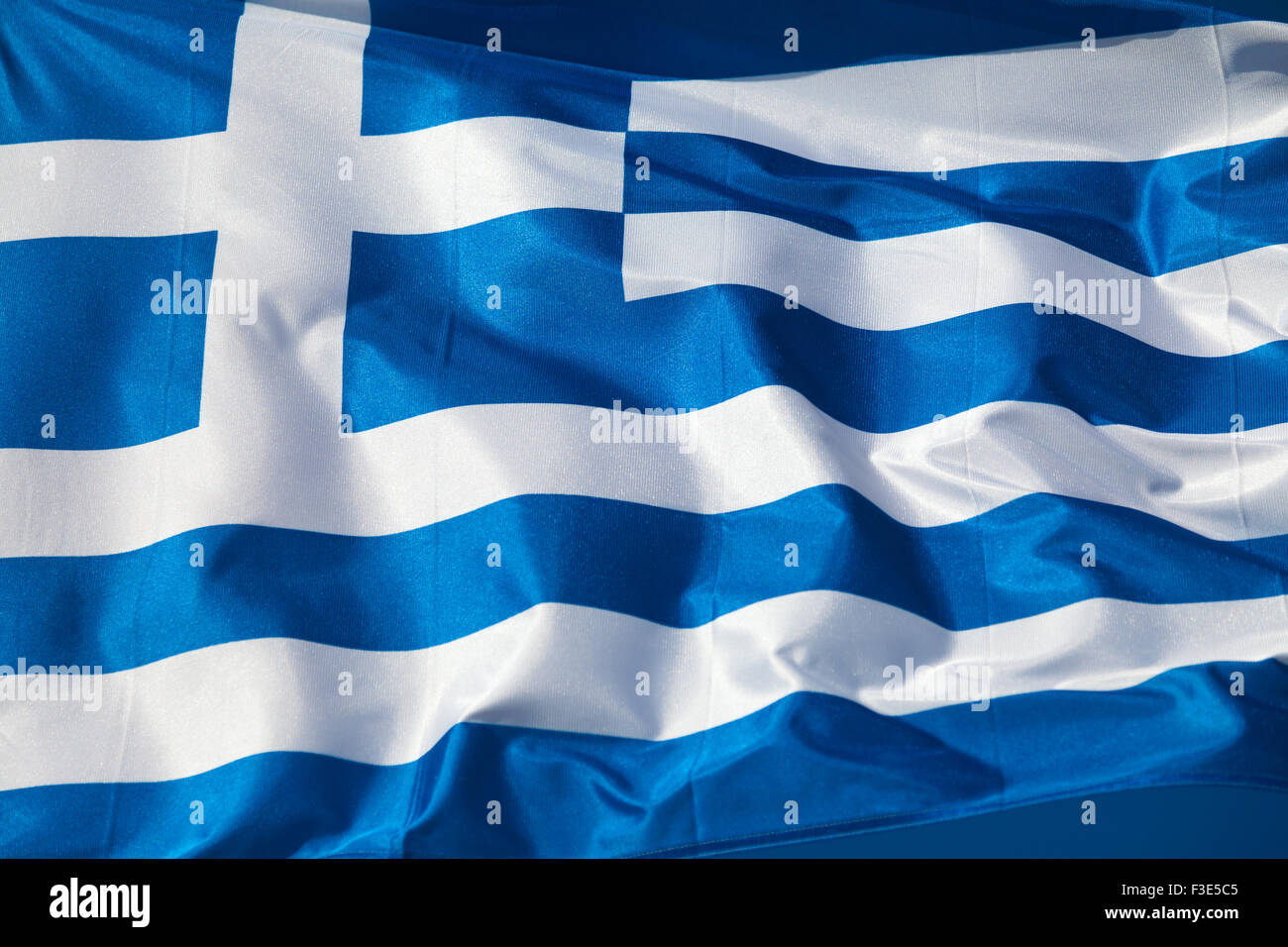 Griechische Flagge winken Stockfoto