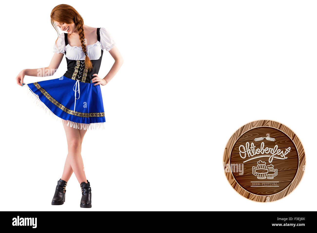 Zusammengesetztes Bild des Oktoberfest Mädchen ihren Rock zu verbreiten Stockfoto