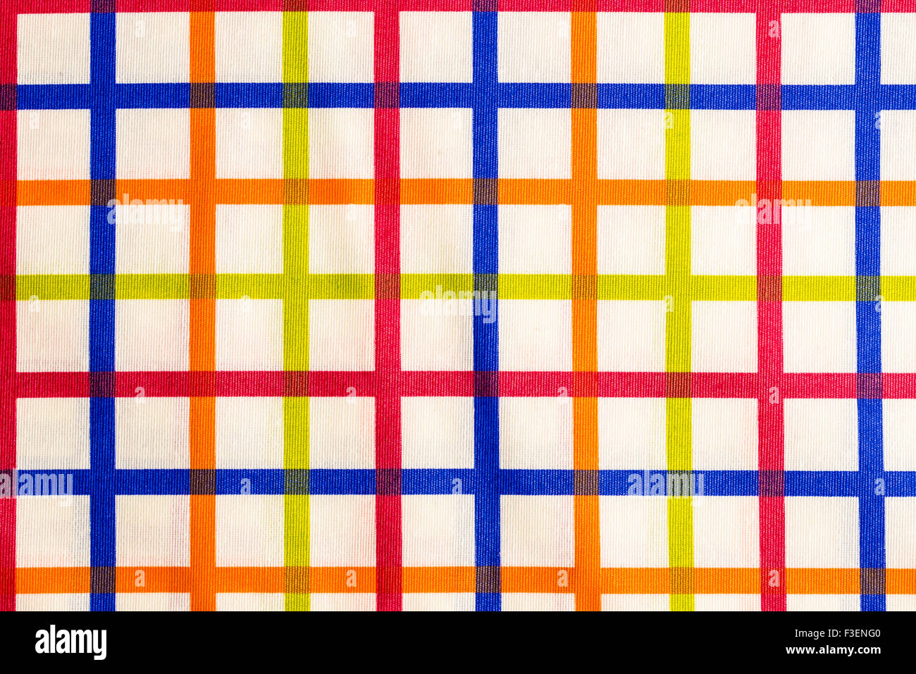 Nahaufnahme einer bunt gestreifte Tischdecke Quadrate bilden Stockfoto