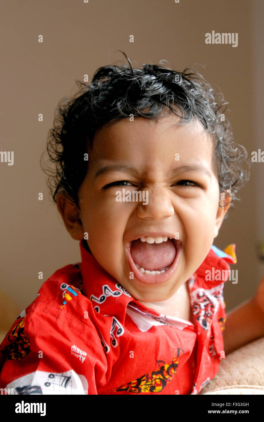 Junge lachend HERR#7 ; HERR#777I Stockfoto