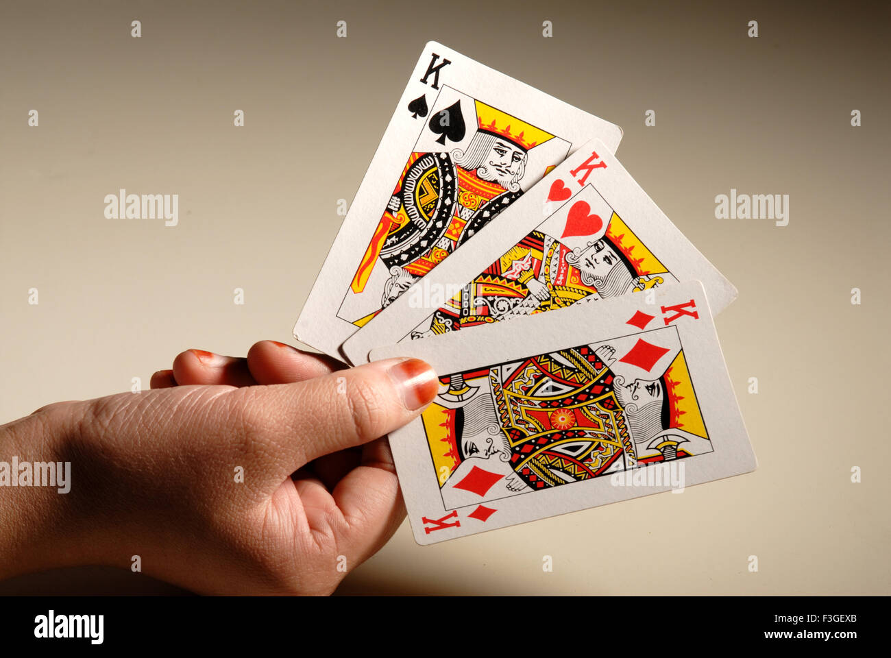 Internationale Spiel; Glücksspiel; Spielkarten; Blitz; 3 Könige von Dame-Spieler zeigen; Bombay Mumbai; Maharashtra; Indien Stockfoto
