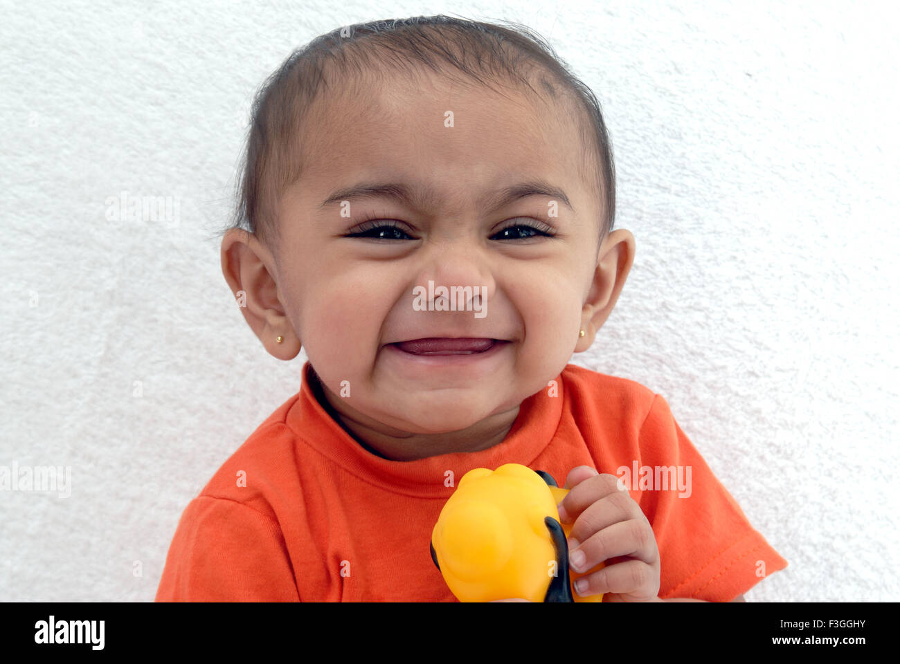 Südasiatische indischen Baby mit einem frechen Ausdruck; Indien Herr #152 Stockfoto