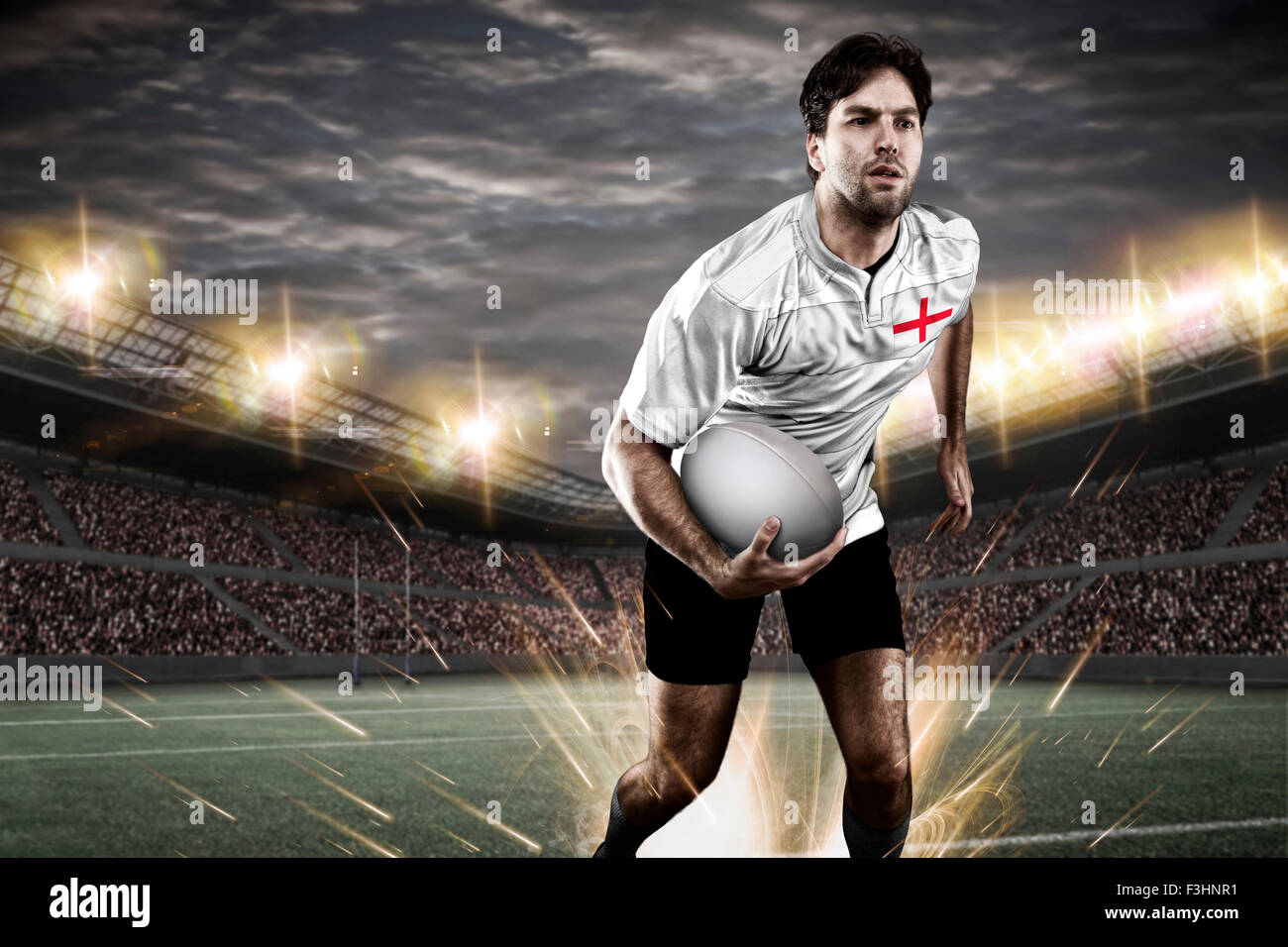 Englische Rugby-Spieler tragen eine weiße Unifrme in einem Stadion. Stockfoto