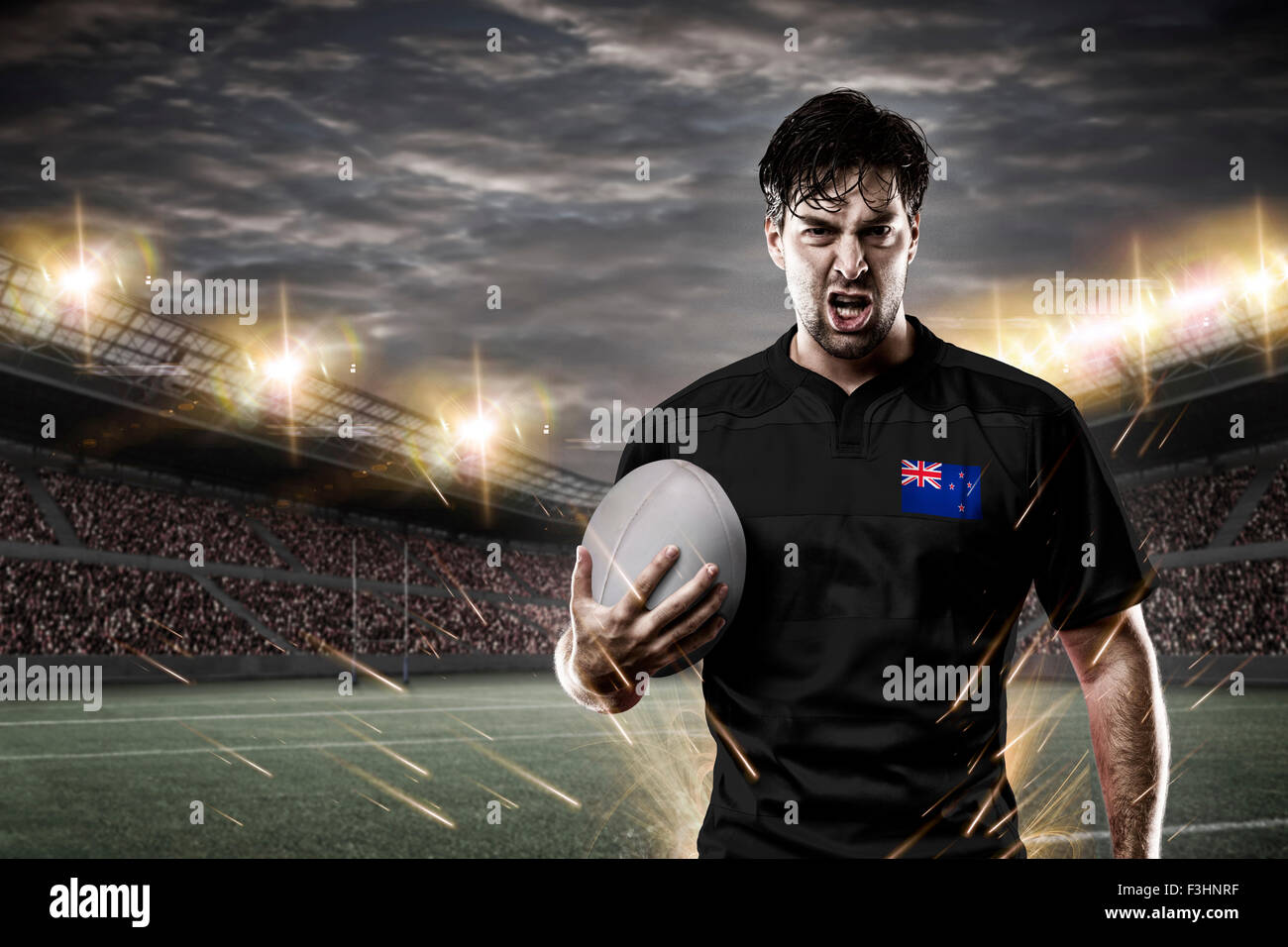Neues Zealander Rugby-Spieler tragen eine weiße Unifrme in einem Stadion. Stockfoto