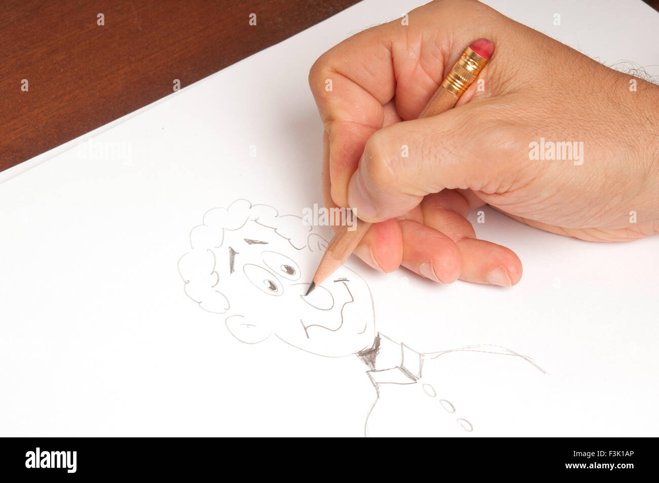 männliche Handzeichnung eine Cartoon-Figur Stockfoto