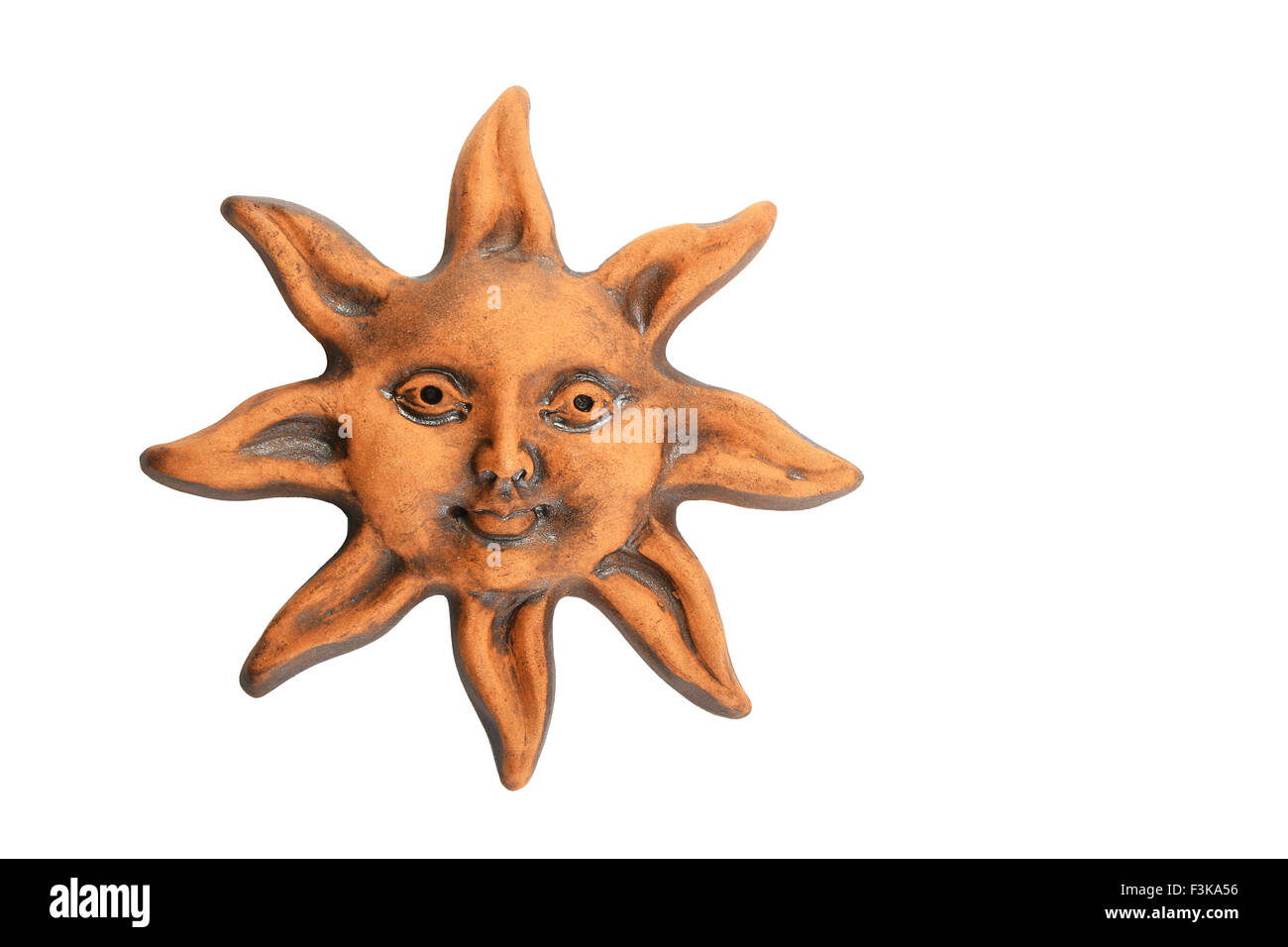 Lächelnde glasierte keramische Smiley Sonne Souvenir isoliert auf weiss Stockfoto