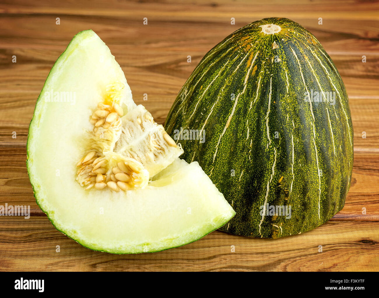 Rustikale Gourmet Weihnachten Melone auf hölzernen Hintergrund Stockfoto