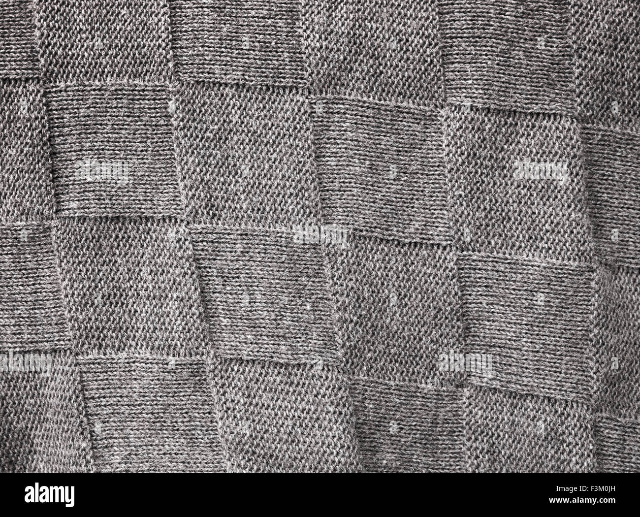 Grauen Wollstoff mit Quadraten Muster Hintergrundtextur Stockfoto