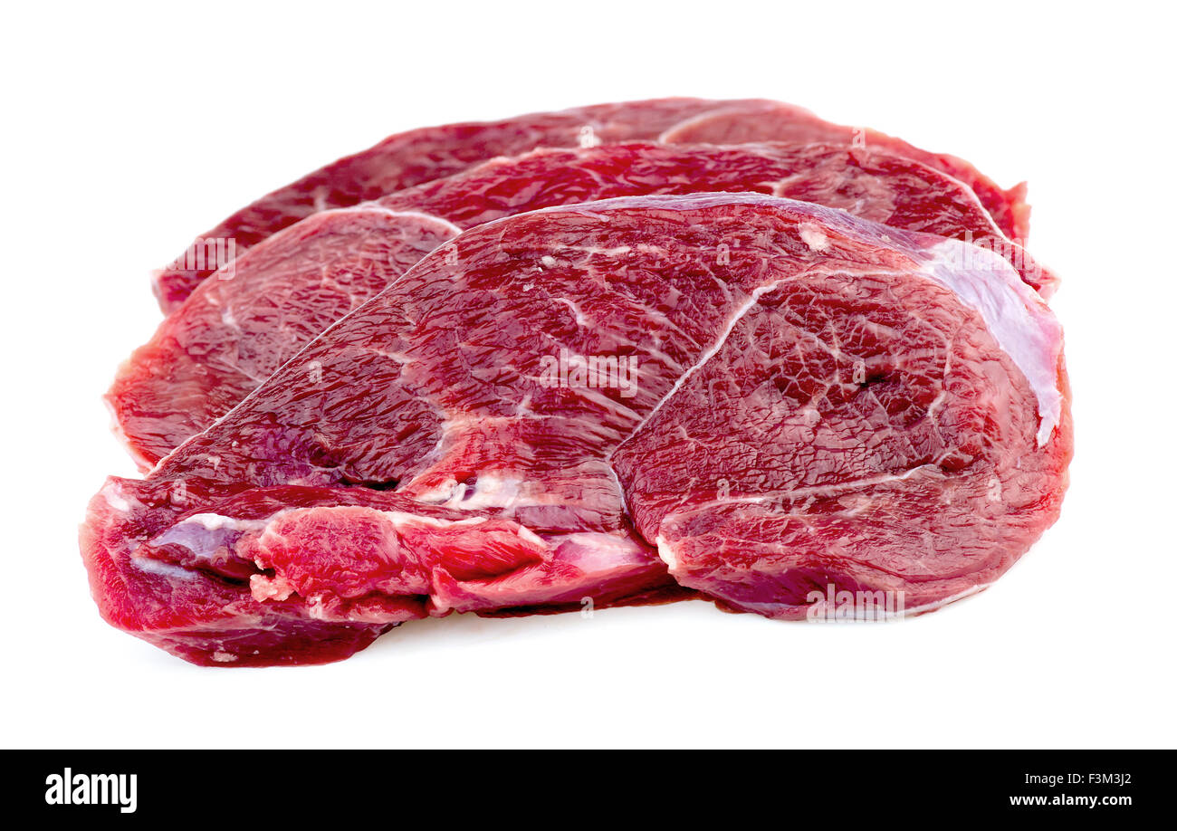 Rohes Rindfleisch Fleisch Schnitzel auf weißem Hintergrund Stockfoto