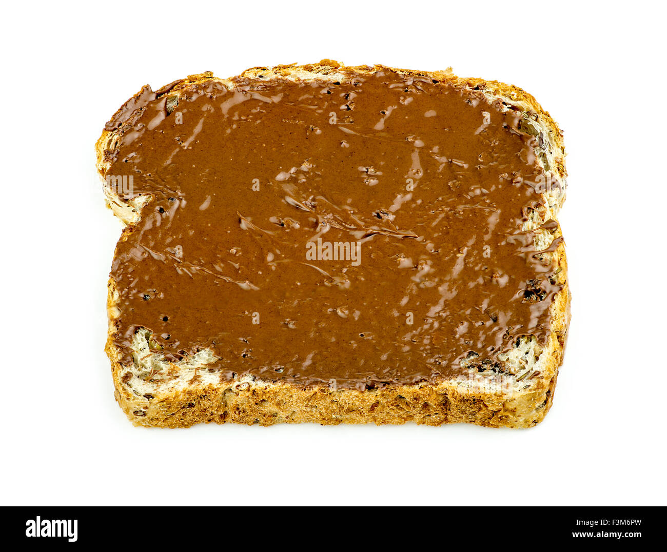 Schokolade Haselnuss verbreitet auf Vollkorn Toast isoliert Stockfoto