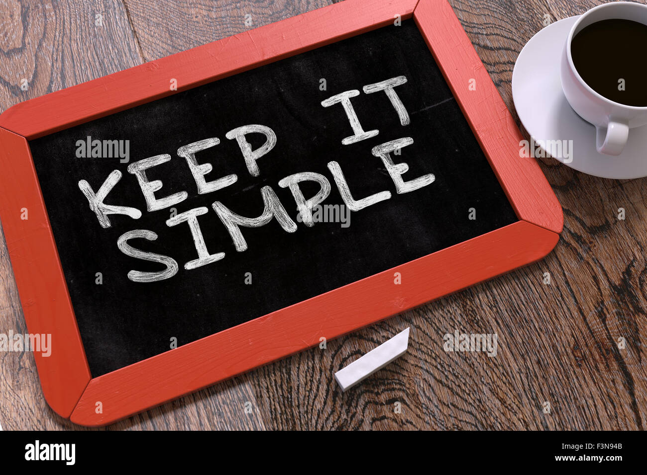 Keep It Simple handschriftlich auf Tafel. Stockfoto