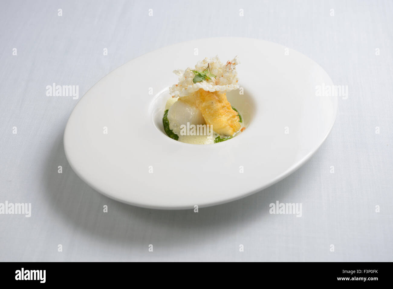 Nouvelle Cuisine Gourmet-Kabeljau Fischgericht Stockfoto