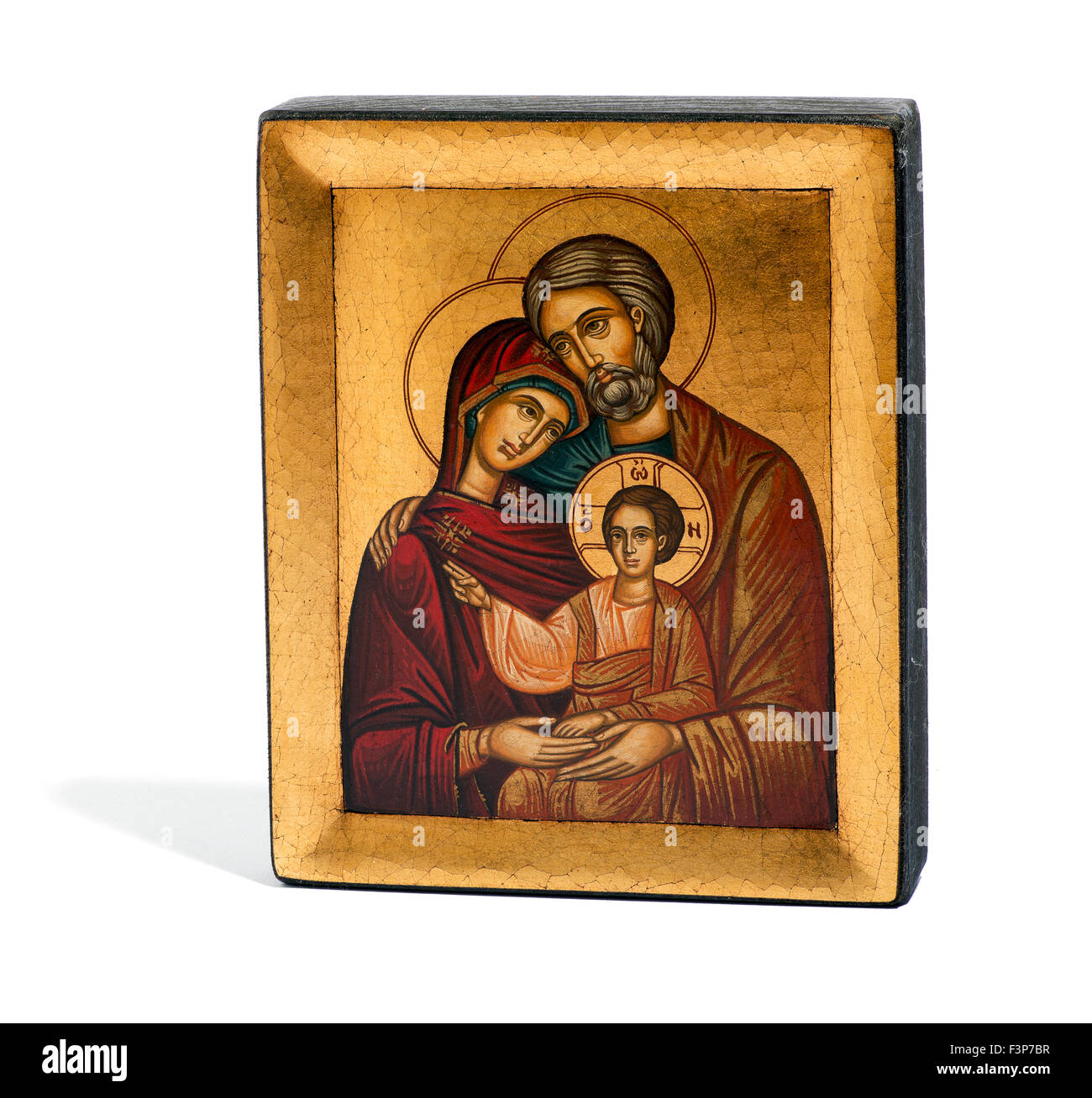 Vergoldete bemalte hölzerne religiöse Ikonographie von Joseph, Maria und das Jesuskind Stockfoto