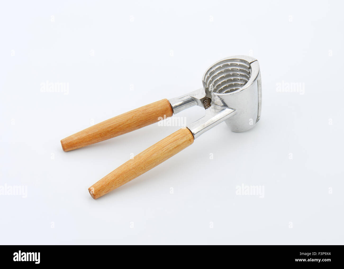 leere Nussknacker auf weißem Hintergrund Stockfoto