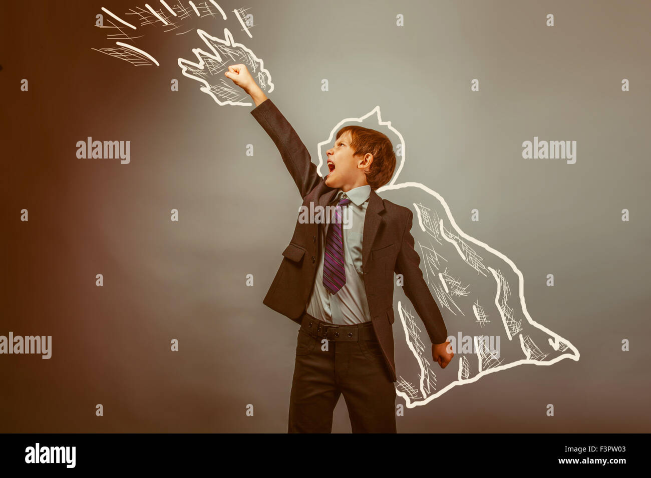 Superheld Junge hob seine Hände Supermacht Geschäftsmann fliegen beh Stockfoto