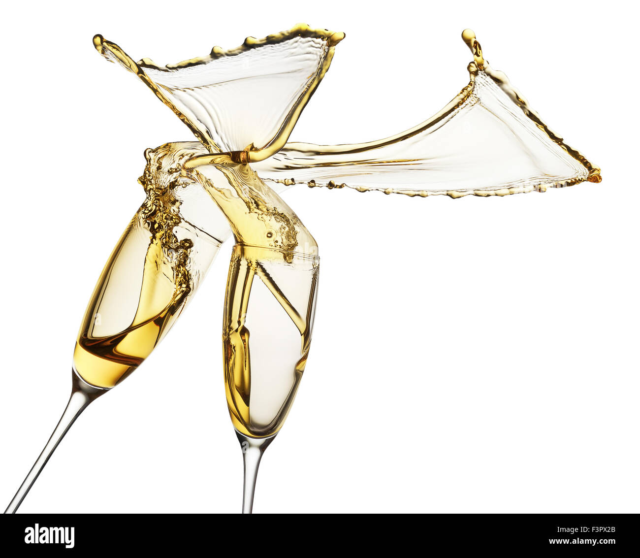 Champagner spritzt aus Gläsern, die auf dem weißen Hintergrund isoliert. Stockfoto